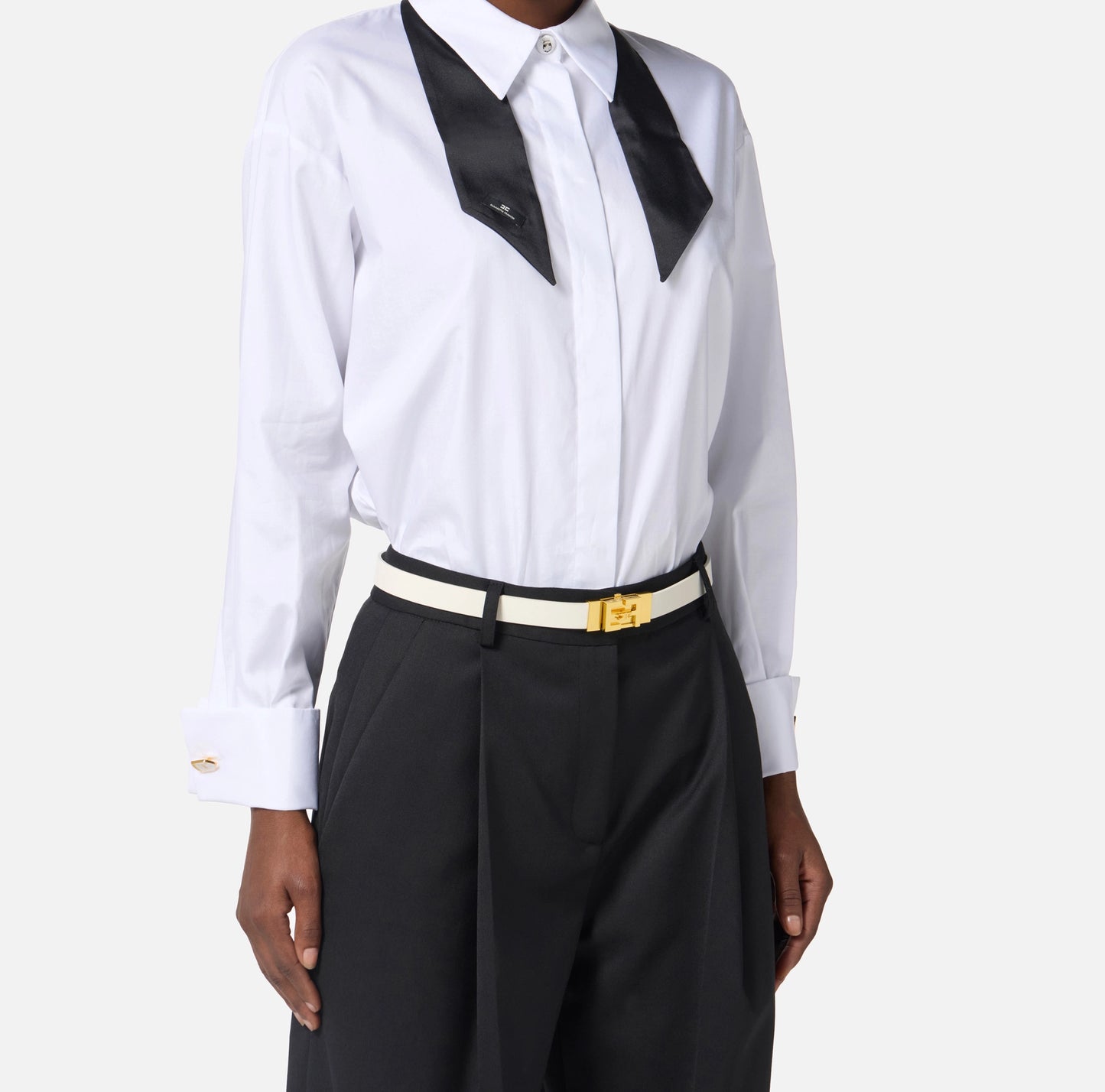 High-waisted belt in semi-gloss leather