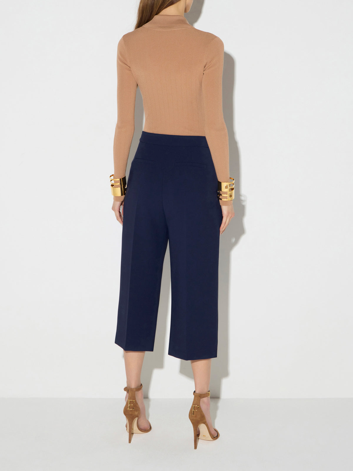 Knit bodysuit with openwork embroideries