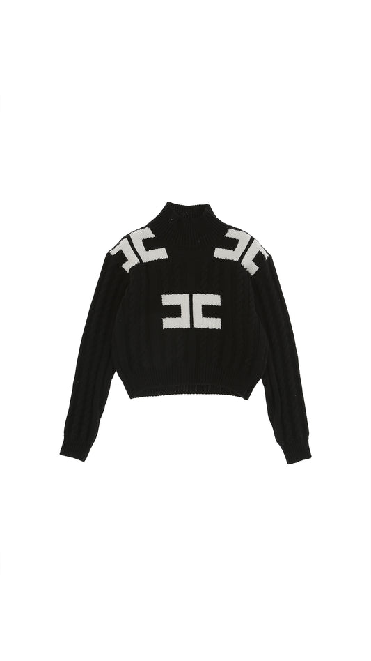 Black sweater with white text patterns
