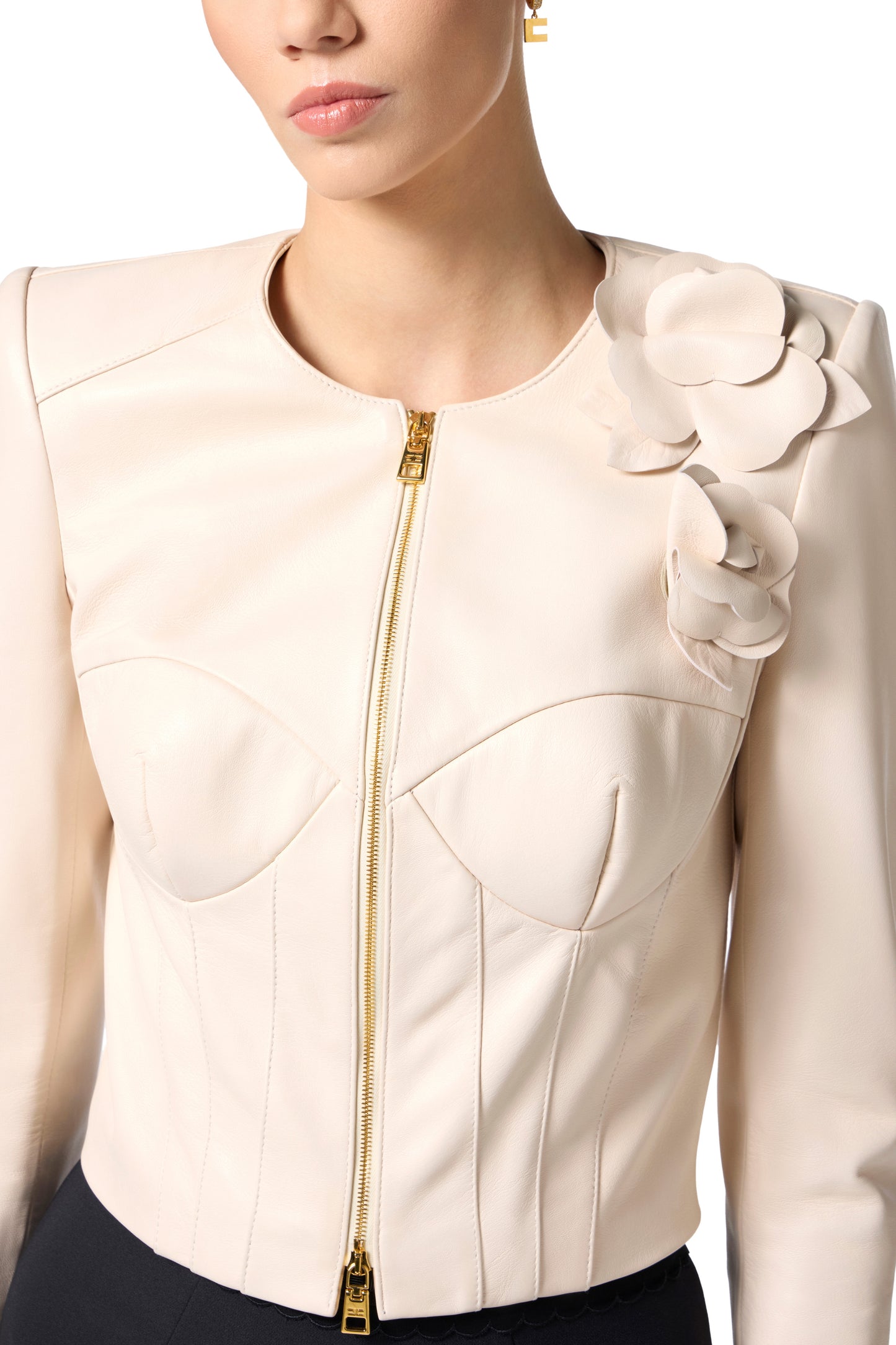 Leather jacket with flower appliqués