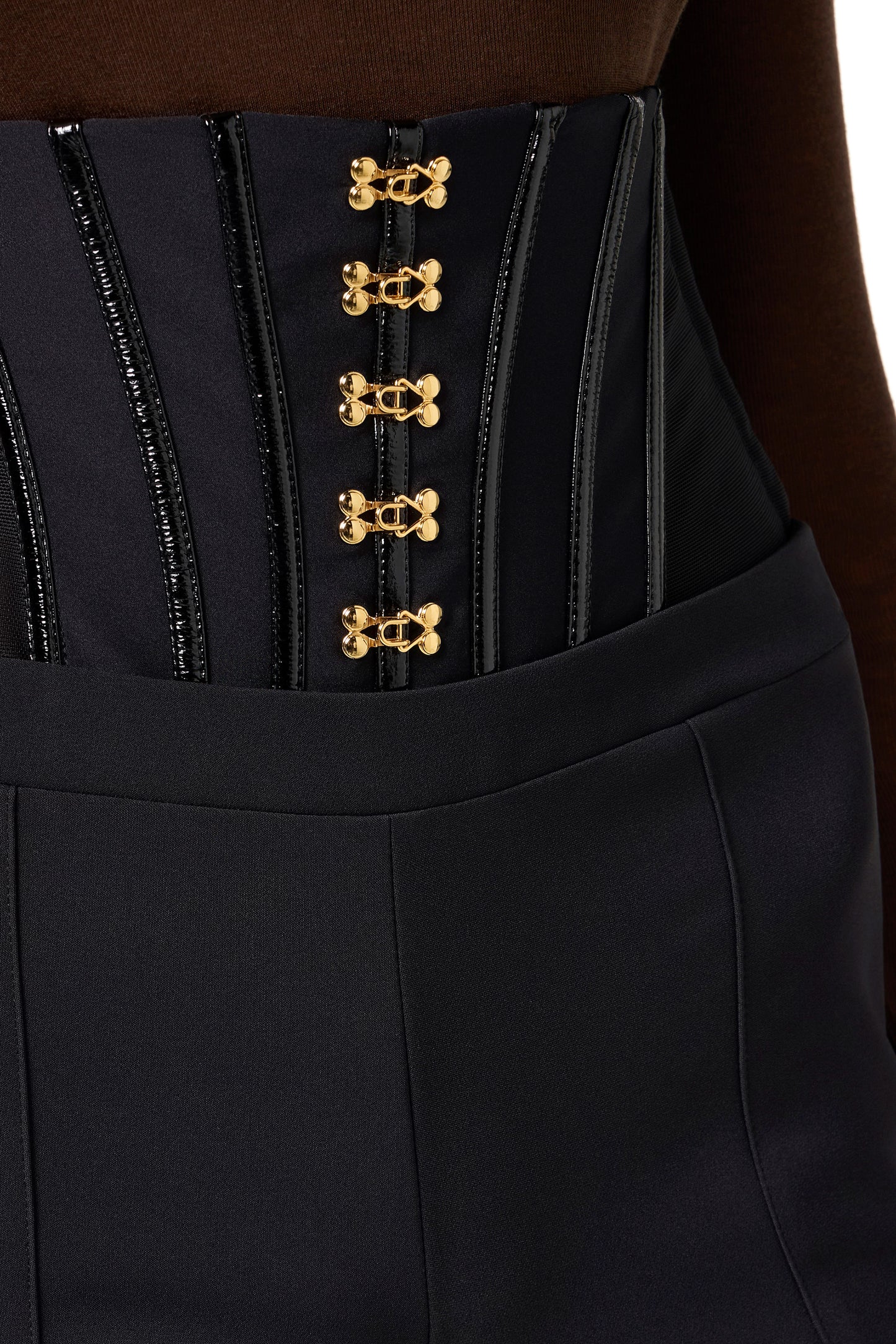 Trousers in lightweight crêpe fabric with jewel clasps