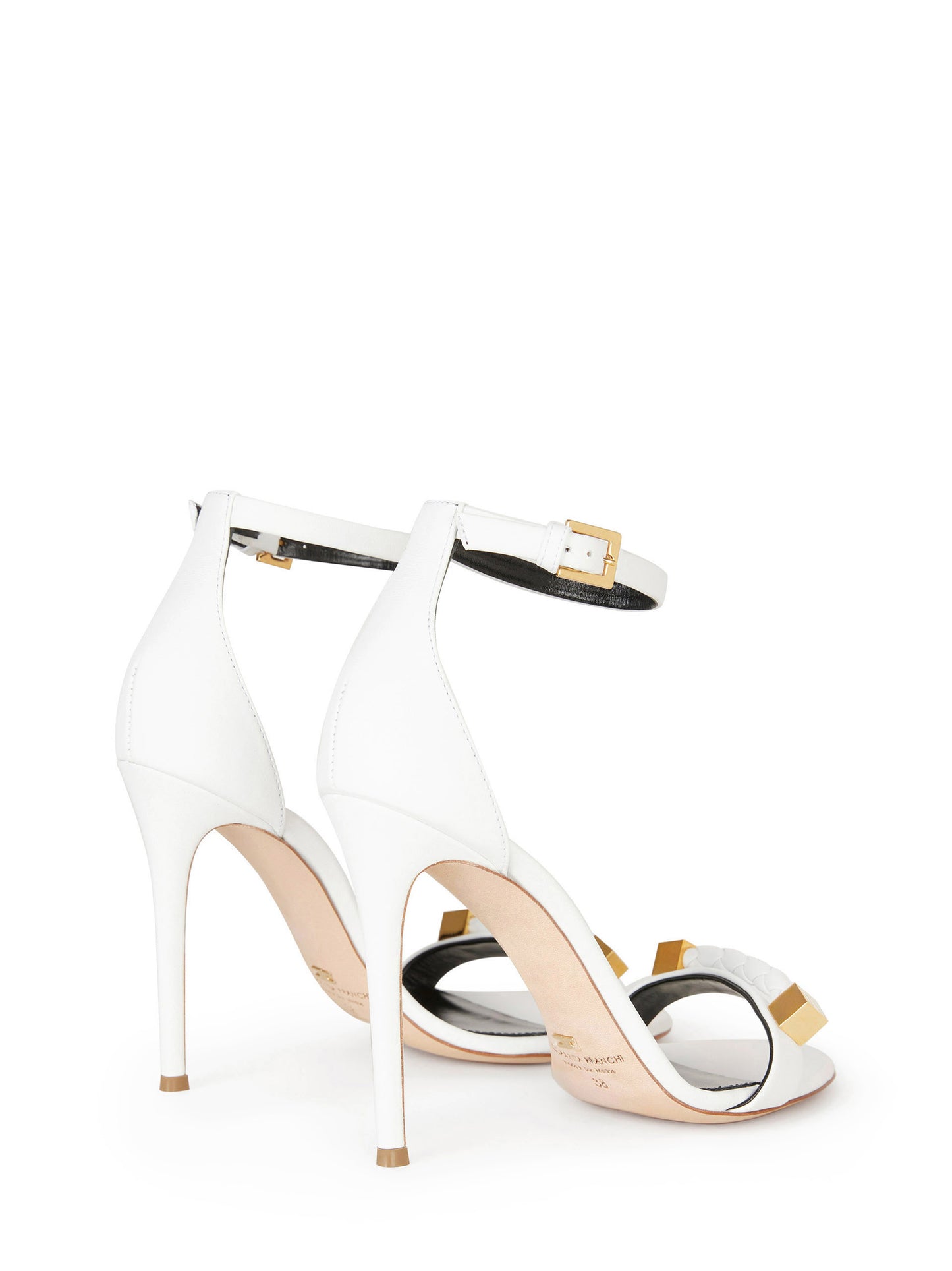High-heeled sandals with gold accents