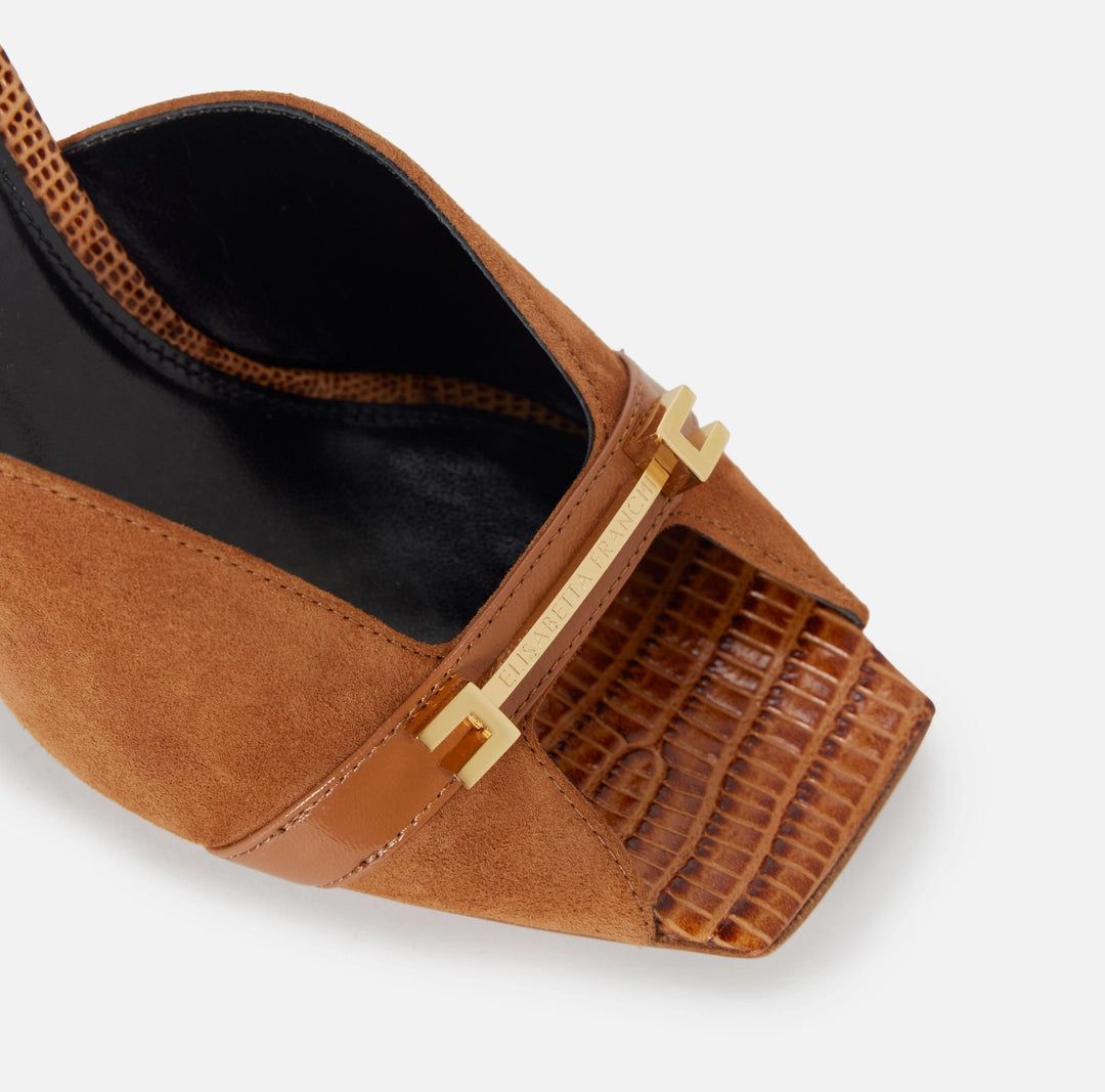 Riviera suede mules with jeweled logo