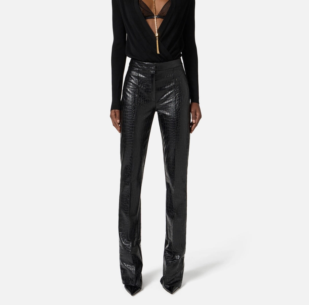 Trousers with crocodile print