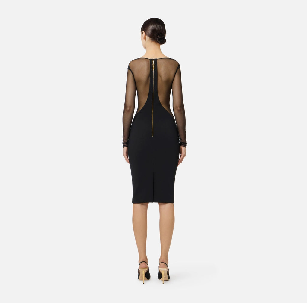 Dress in lightweight crêpe and tulle fabrics with cut-outs