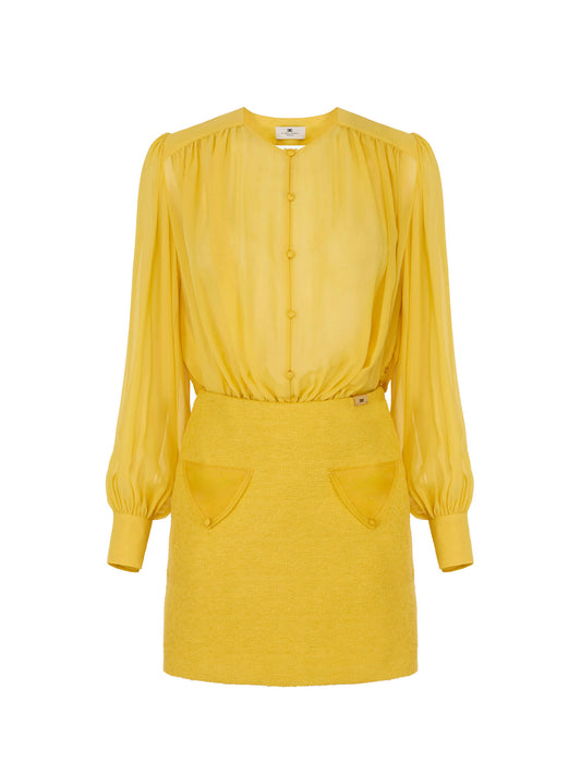 Dress in georgette and bouclé tweed fabrics