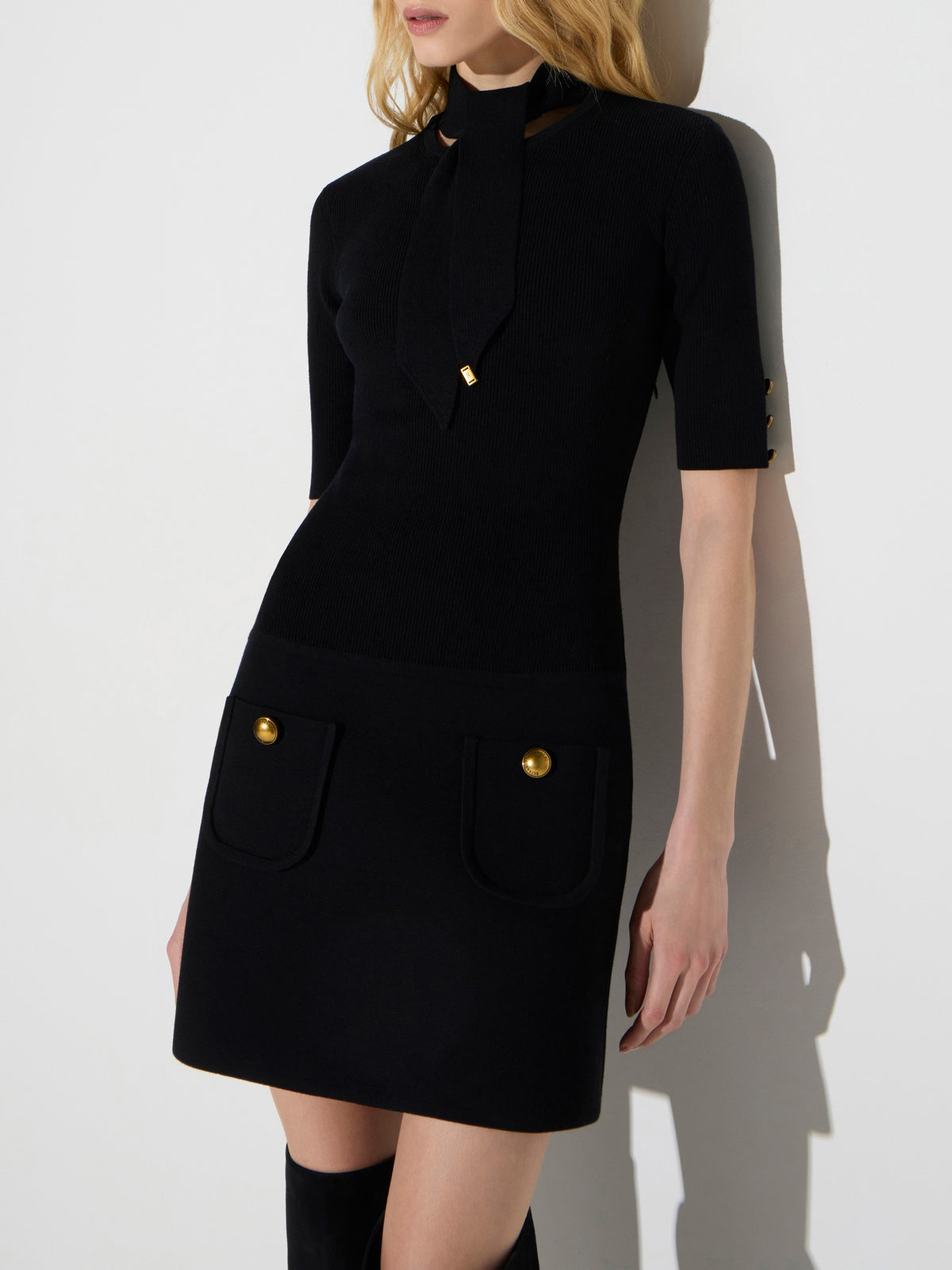 Mini dress in knit fabric with jewel buttons