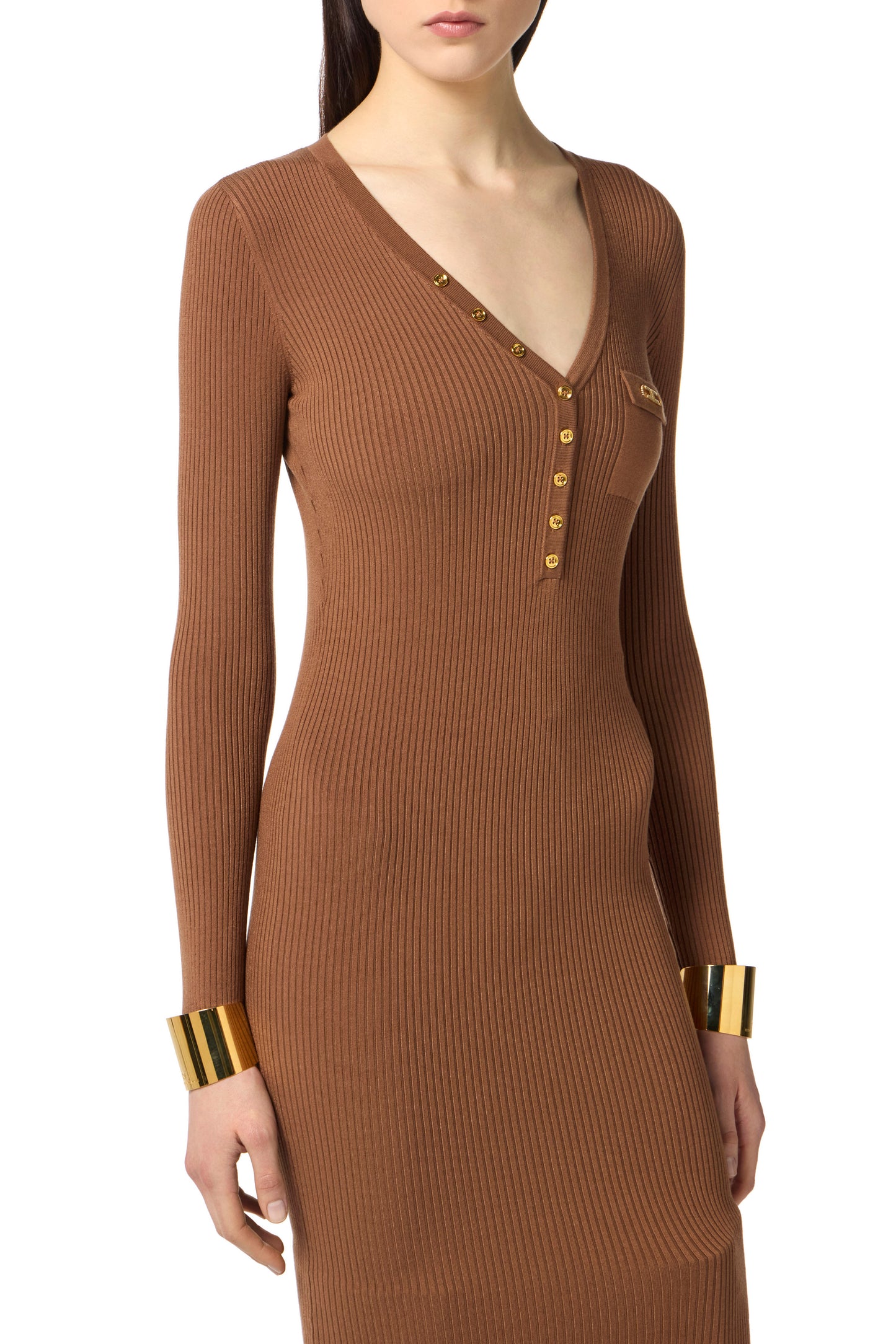 Dress in ribbed knit fabric with breast pocket