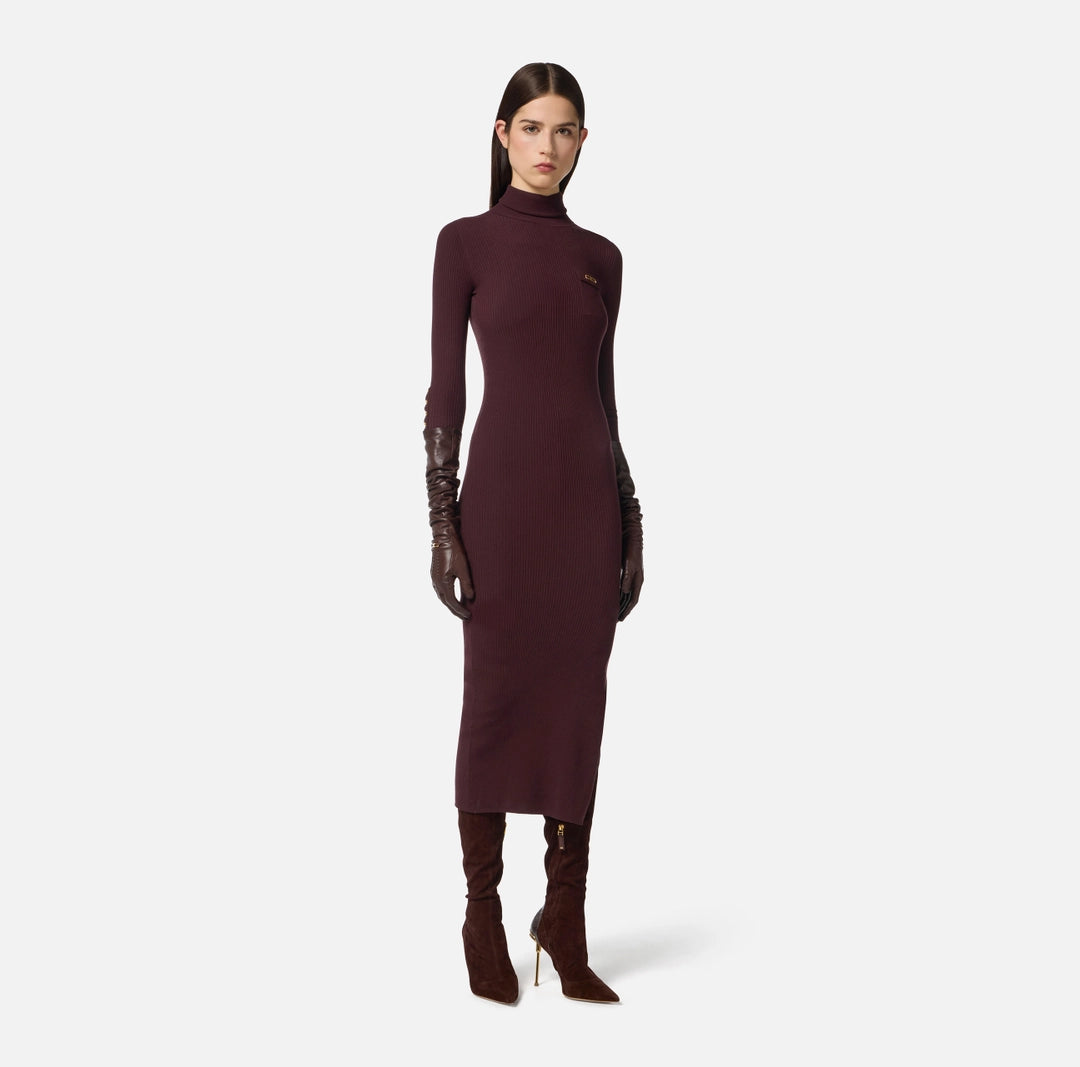Dress in ribbed knit fabric with breast pocket