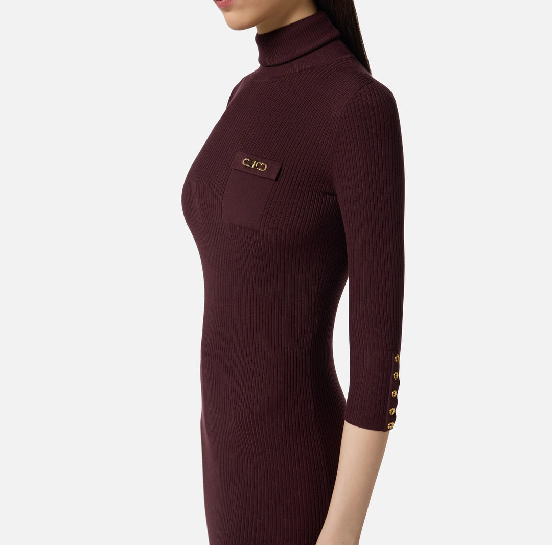 Dress in ribbed knit fabric with breast pocket