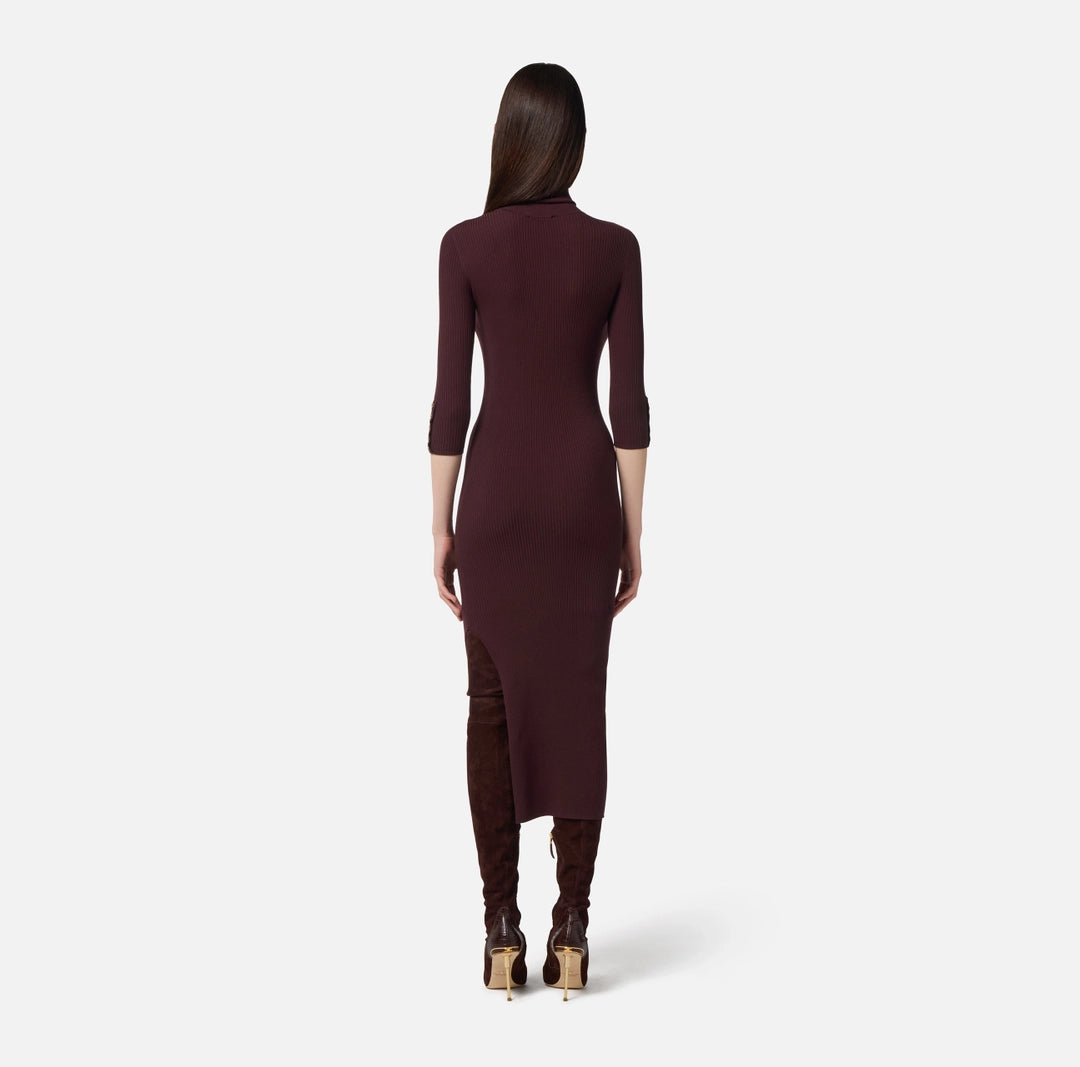 Dress in ribbed knit fabric with breast pocket