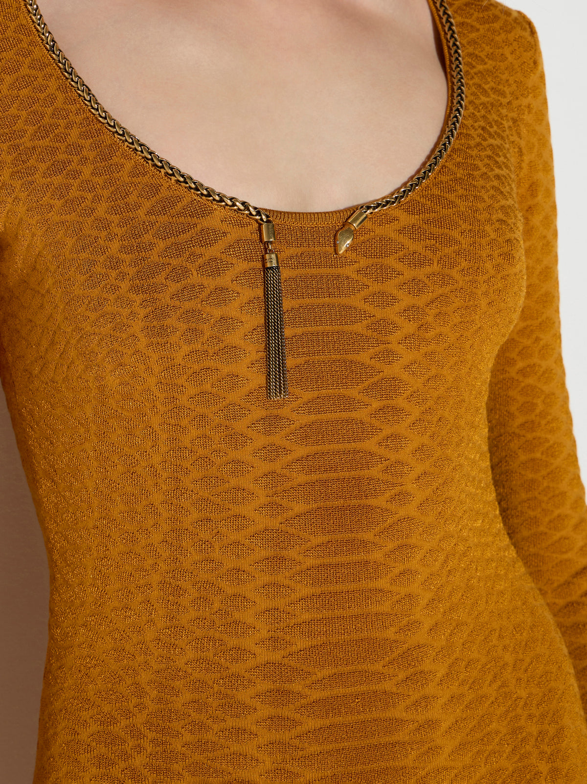 Knit dress with snake pattern