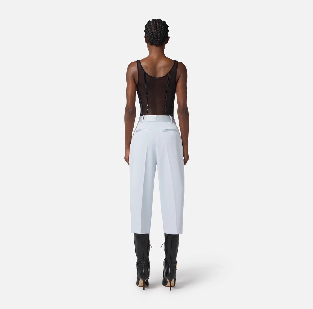 Bodysuit in stretch tulle fabric with vinyl details