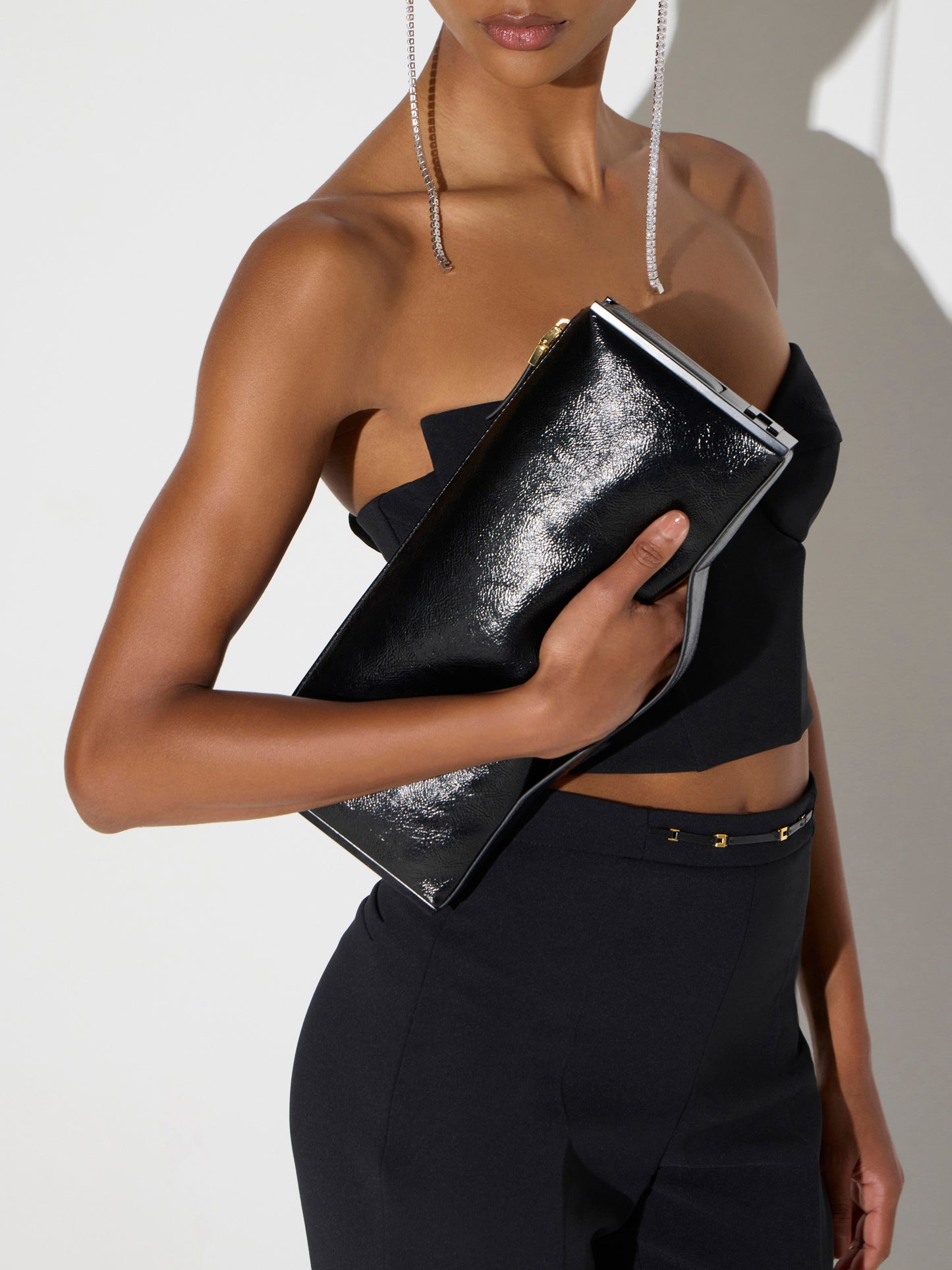 Patent leather clutch bag