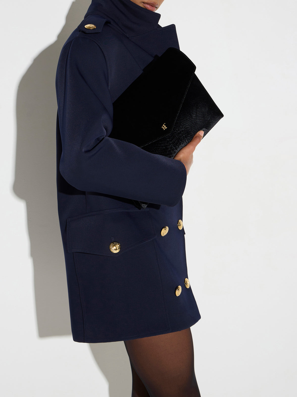 Over-the-shoulder bag made from velvet with a crocodile print texture