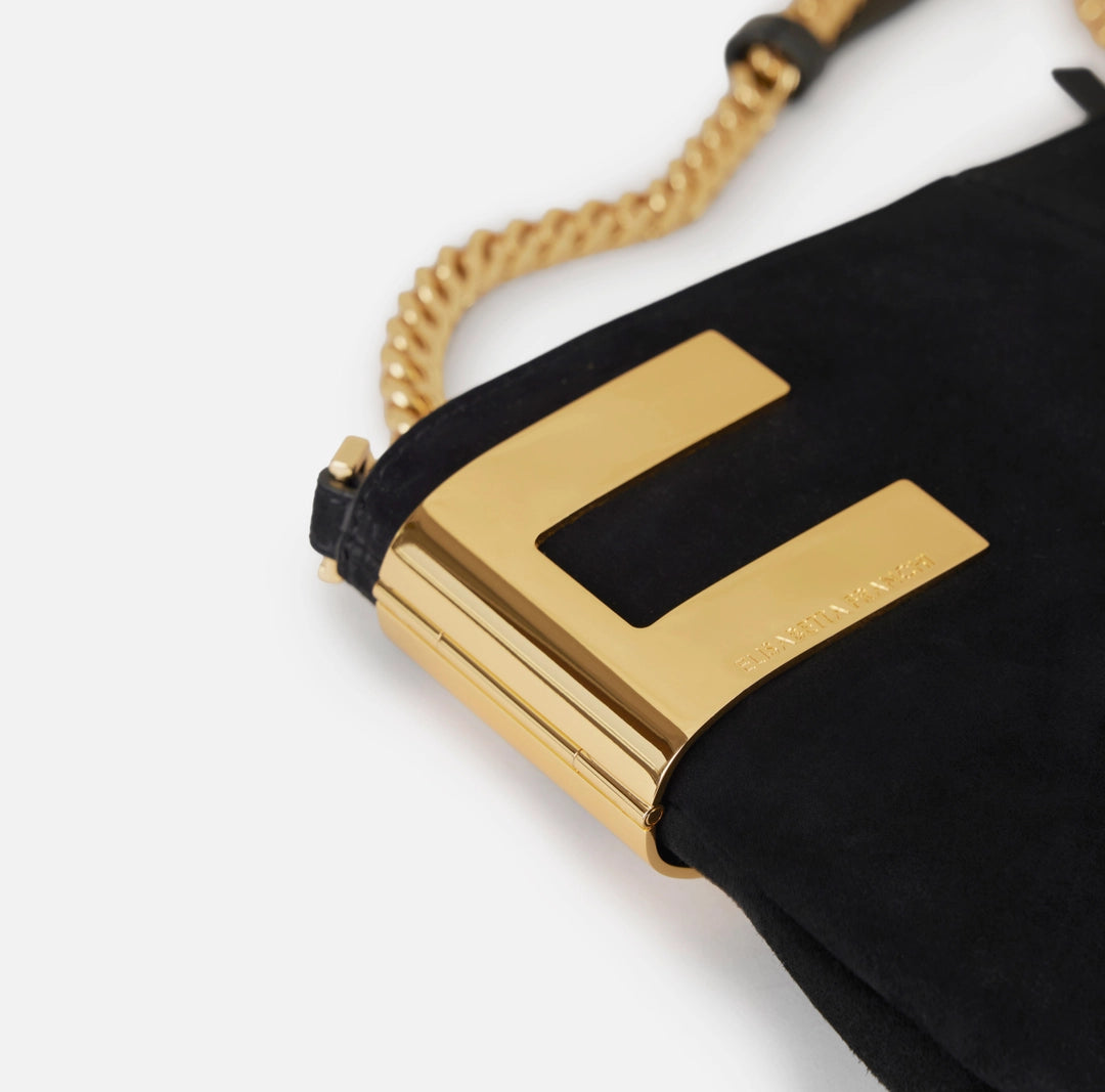 Reve Noir suede shoulder bag with metallic logo