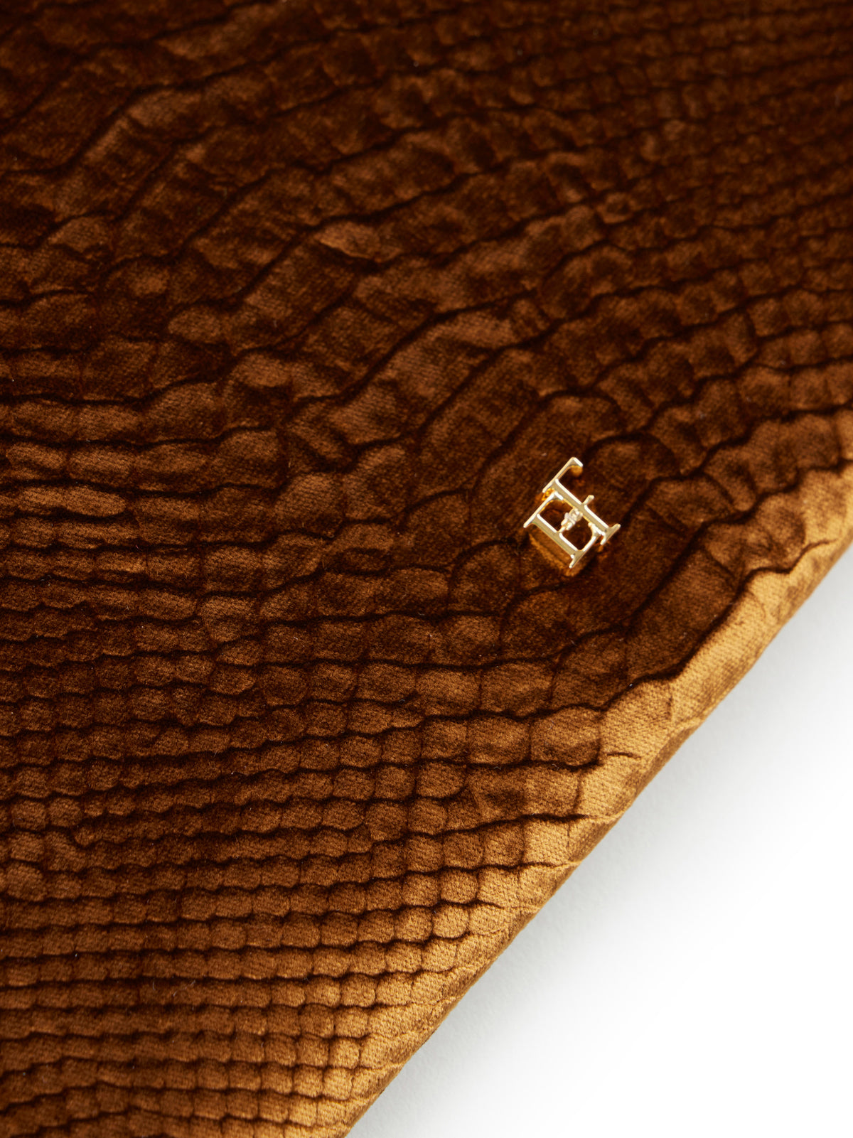 Velvet clutch bag with crocodile print