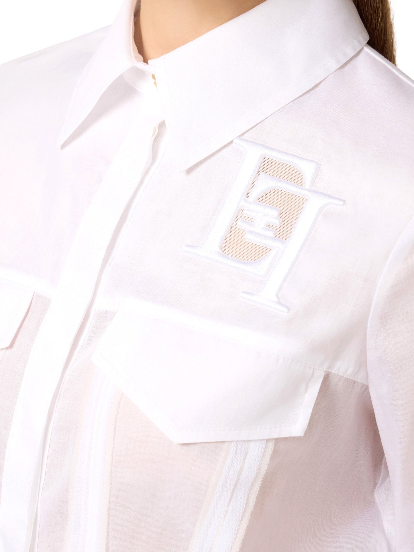 Cotton shirt with flaps and embroideries