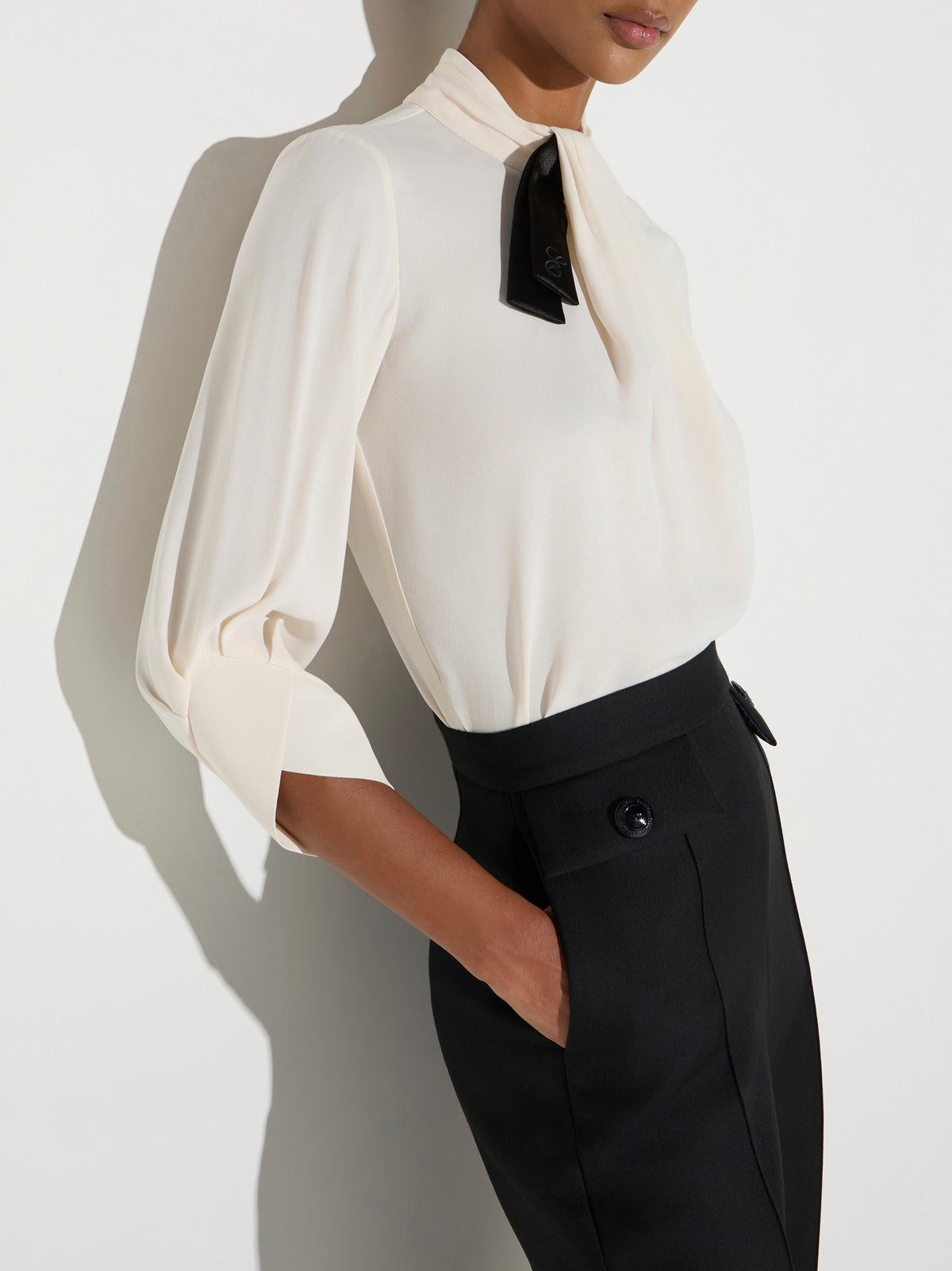 Blouse in georgette fabric with bow-tie
