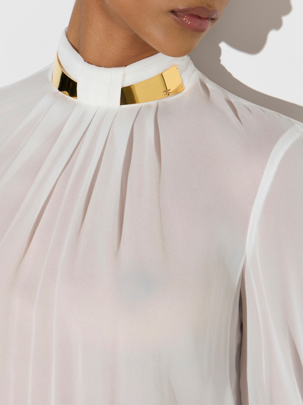 Bodysuit in georgette fabric with jewel collar