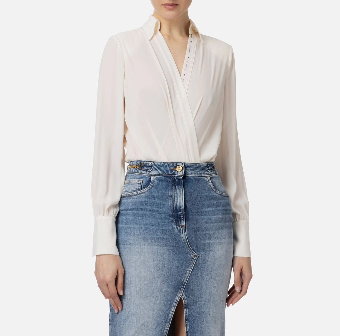 Crossed bodysuit-style shirt in georgette fabric with logoed ribbon