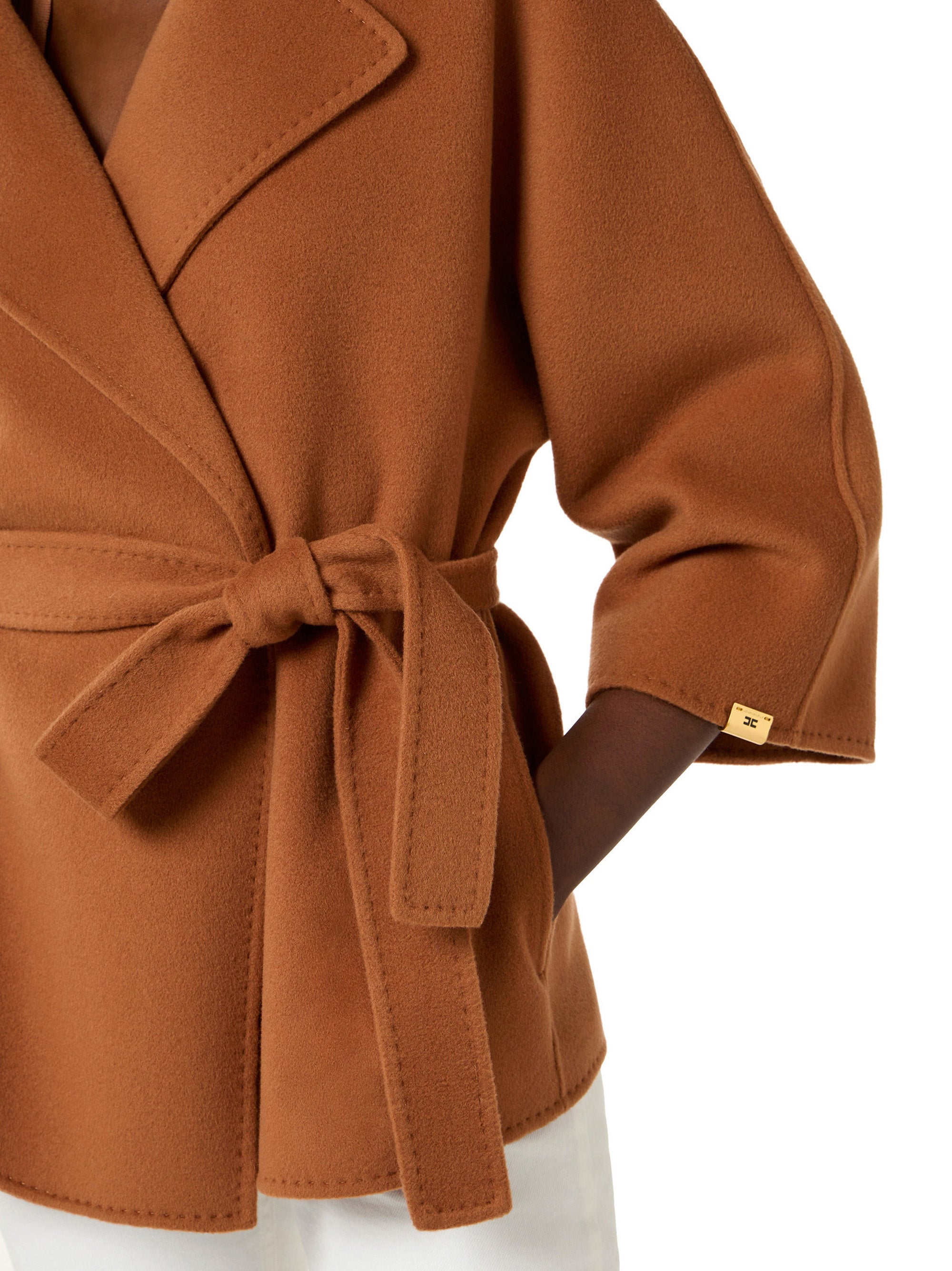 Coat in wool cloth