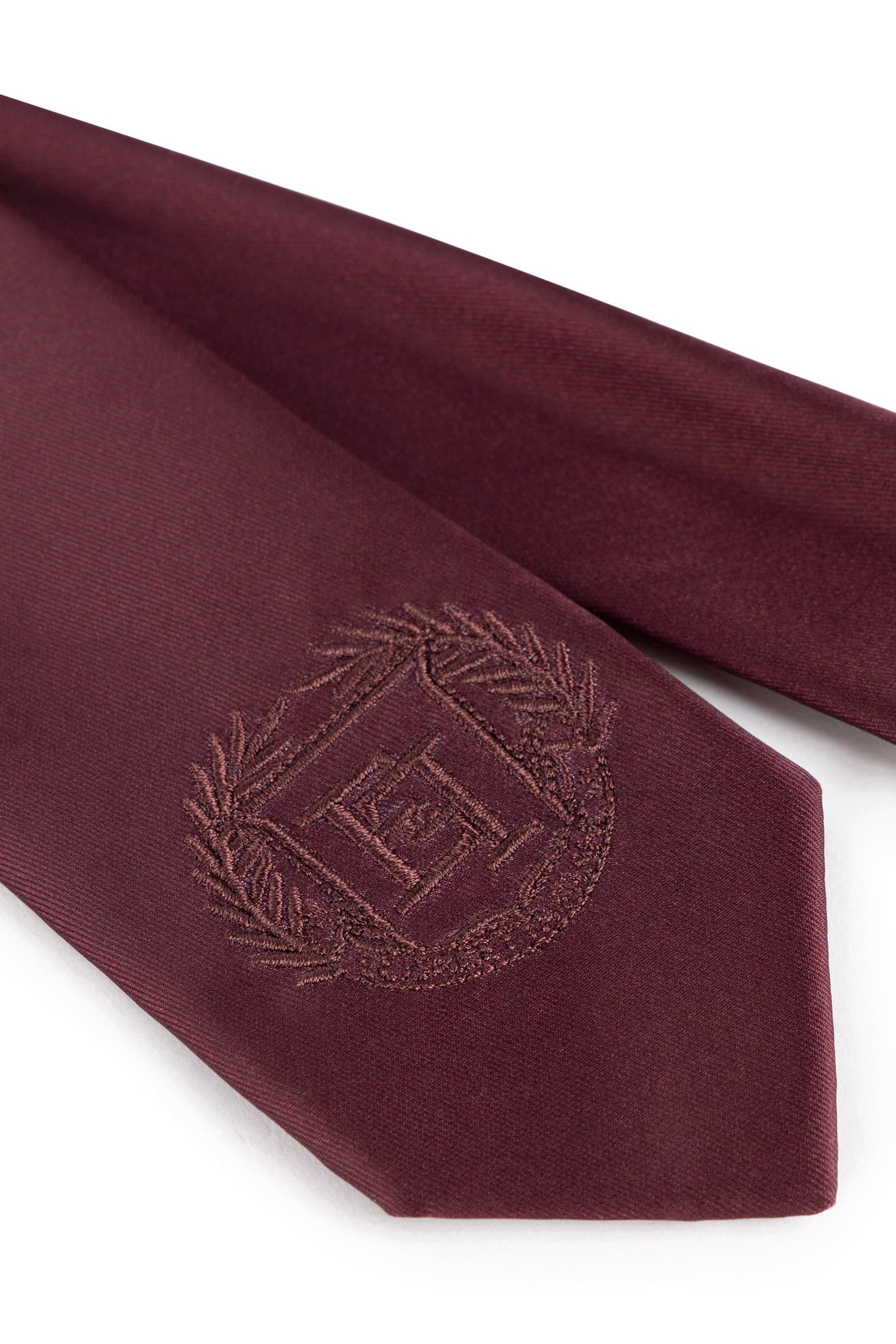 Silk tie with embroidered logo