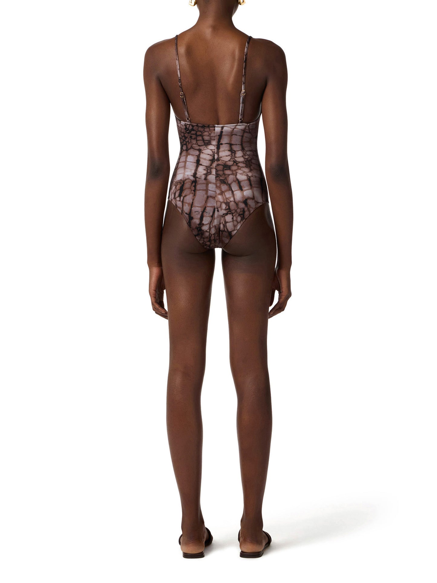 One-piece swimsuit with alligator print