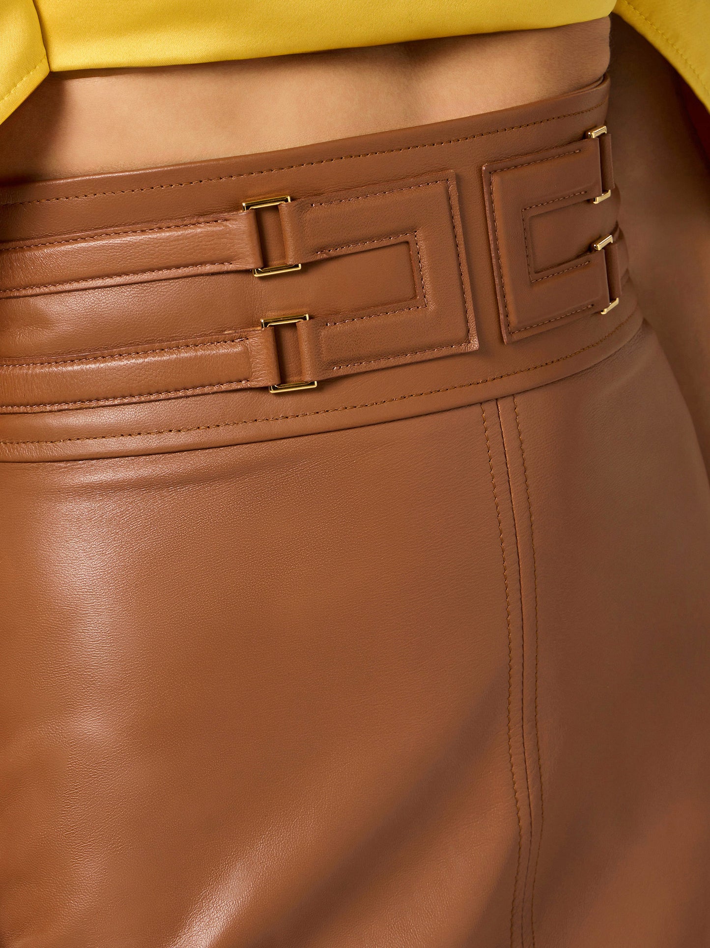 Leather skirt with embossed logo