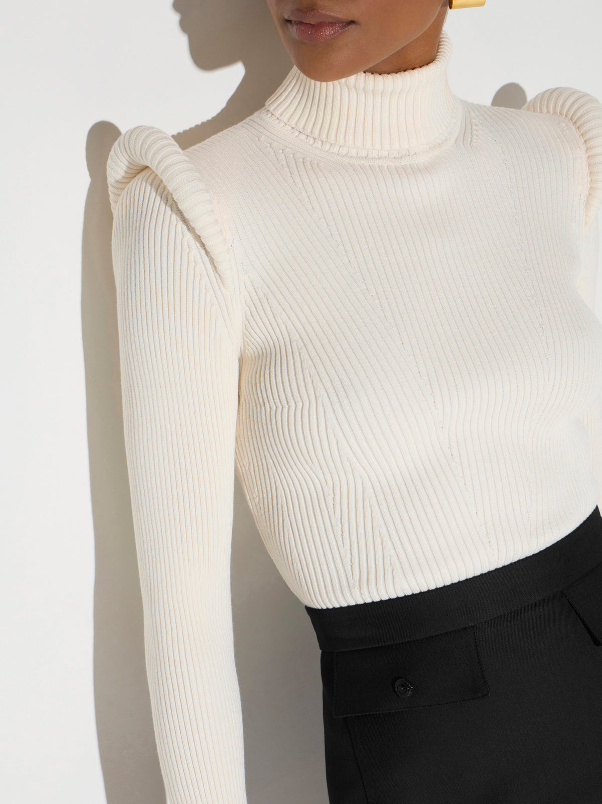 Knit turtleneck top with 3D details