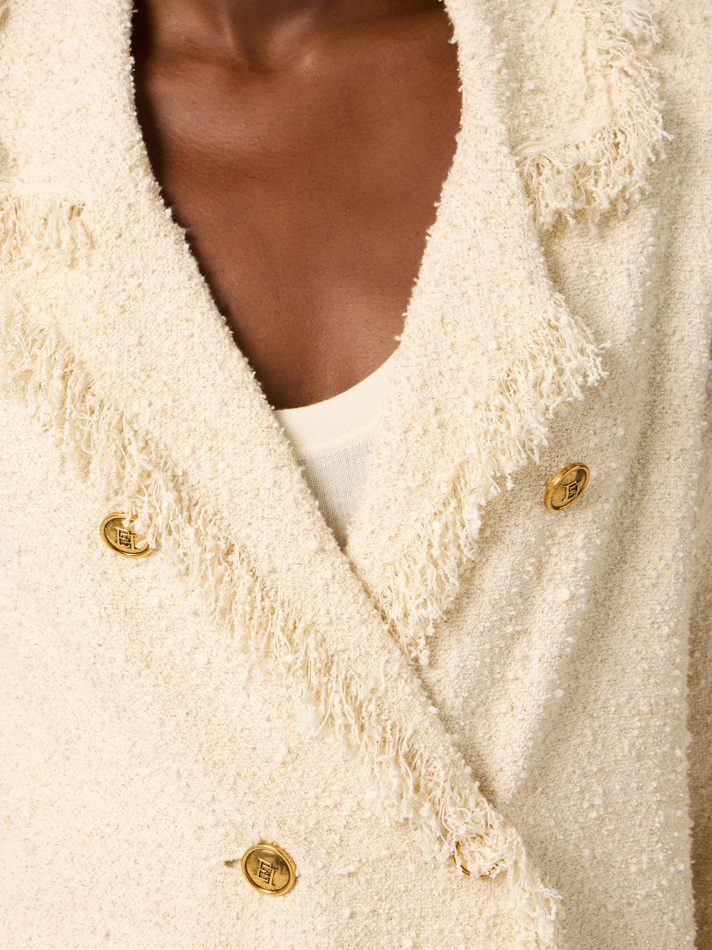 Bouclé knit jacket with fringes