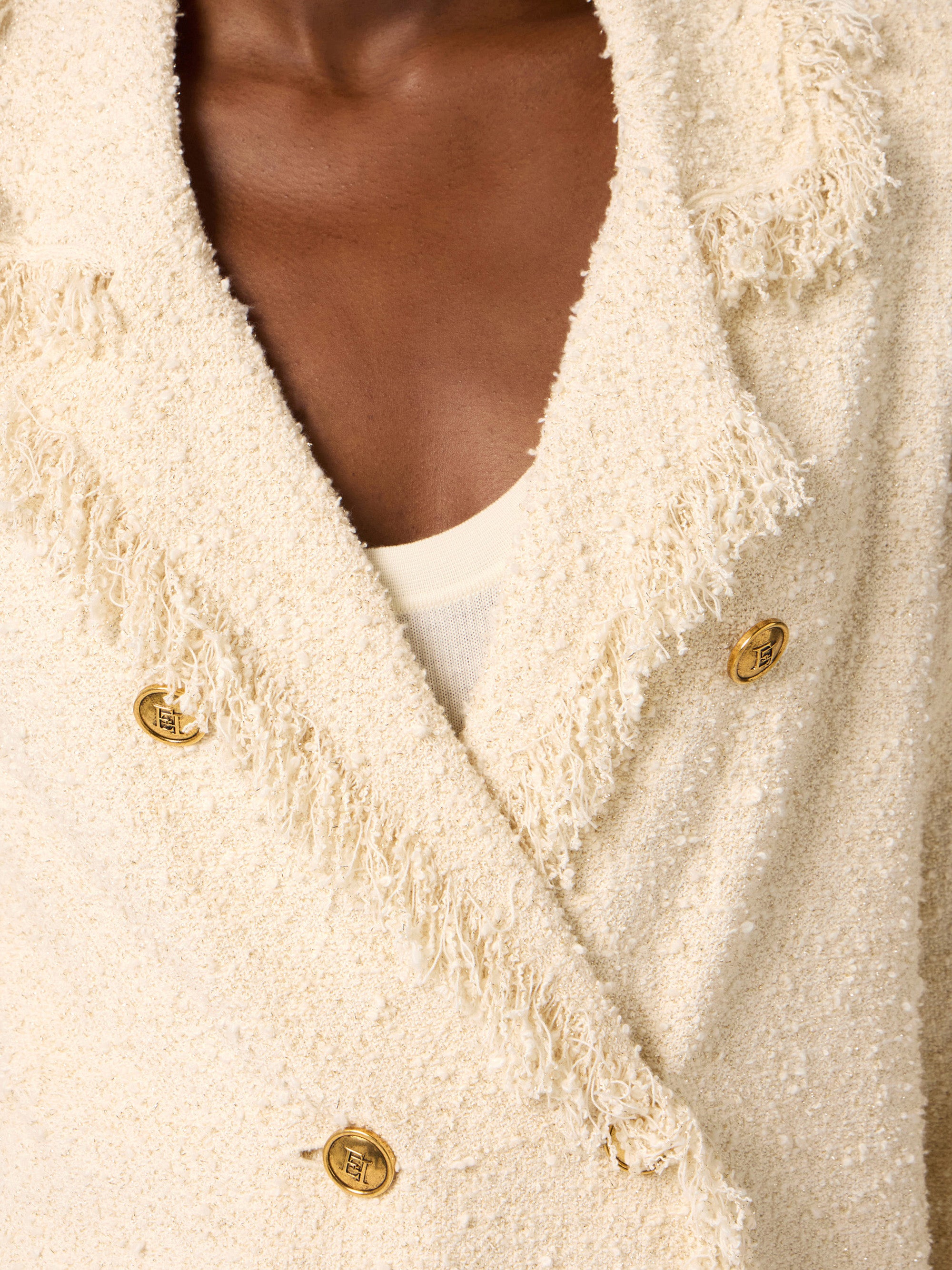 Bouclé knit jacket with fringes