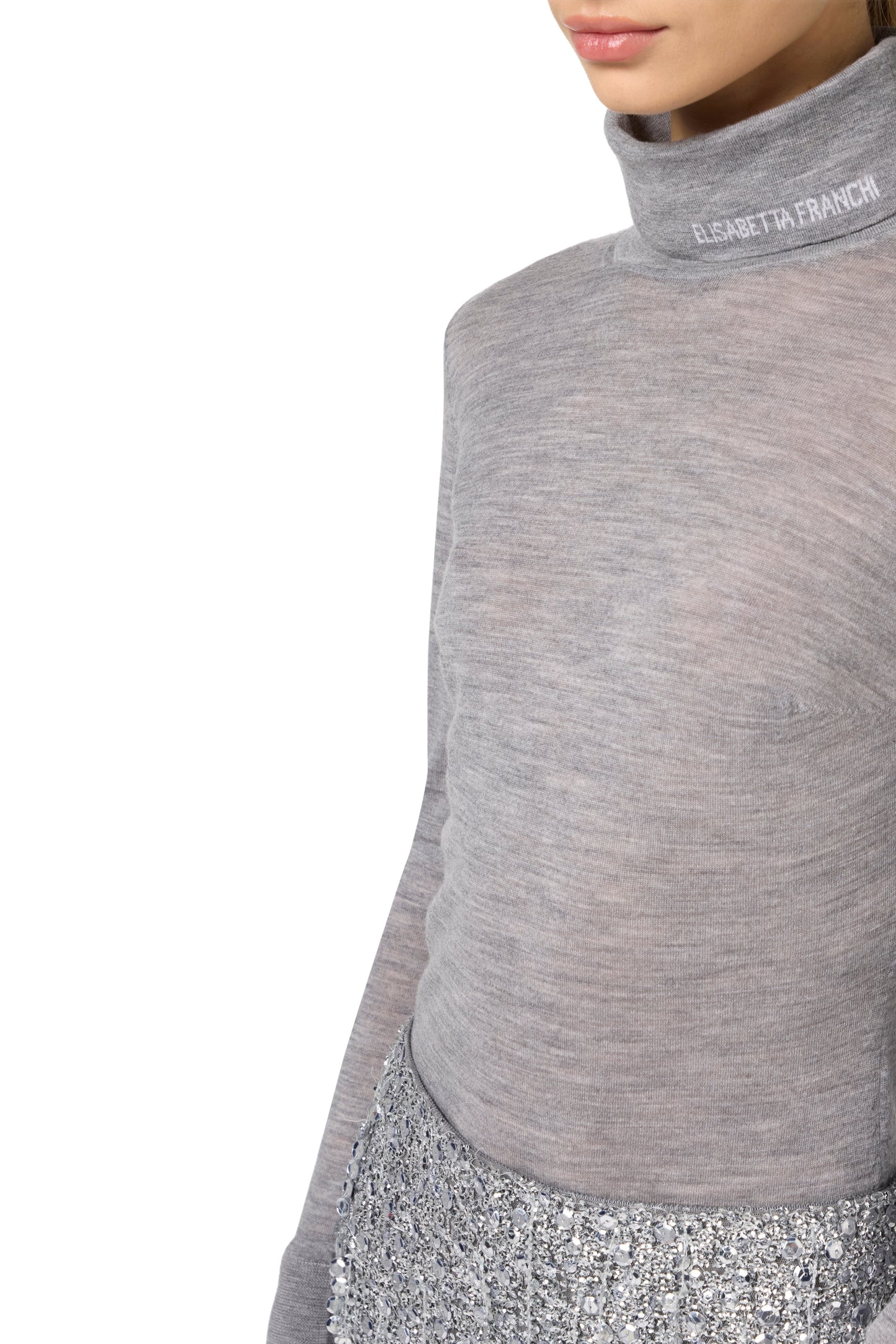 Turtleneck top in merino wool fabric with jacquard logo