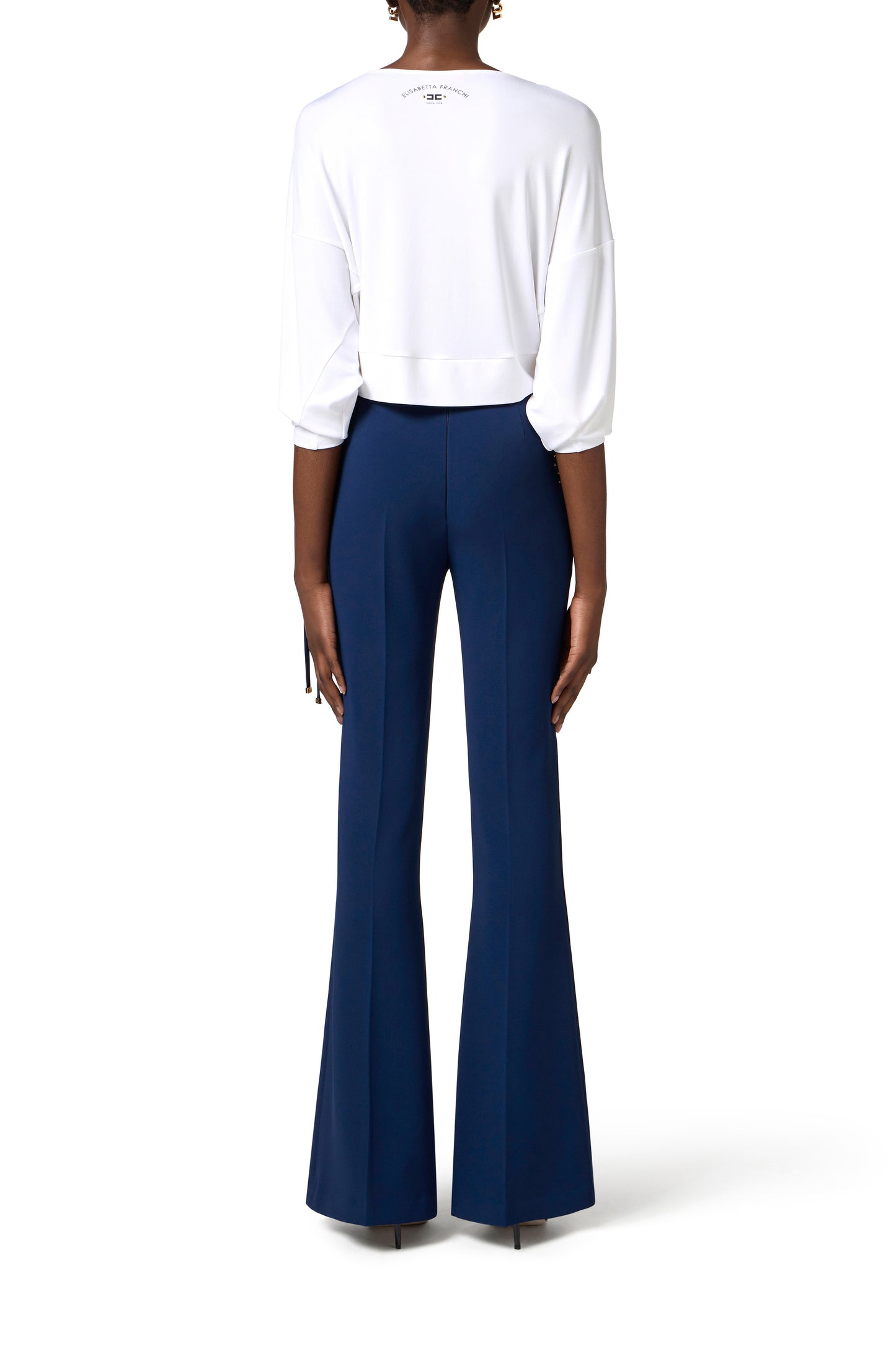 Crêpe bell-bottom trousers with criss-cross laces