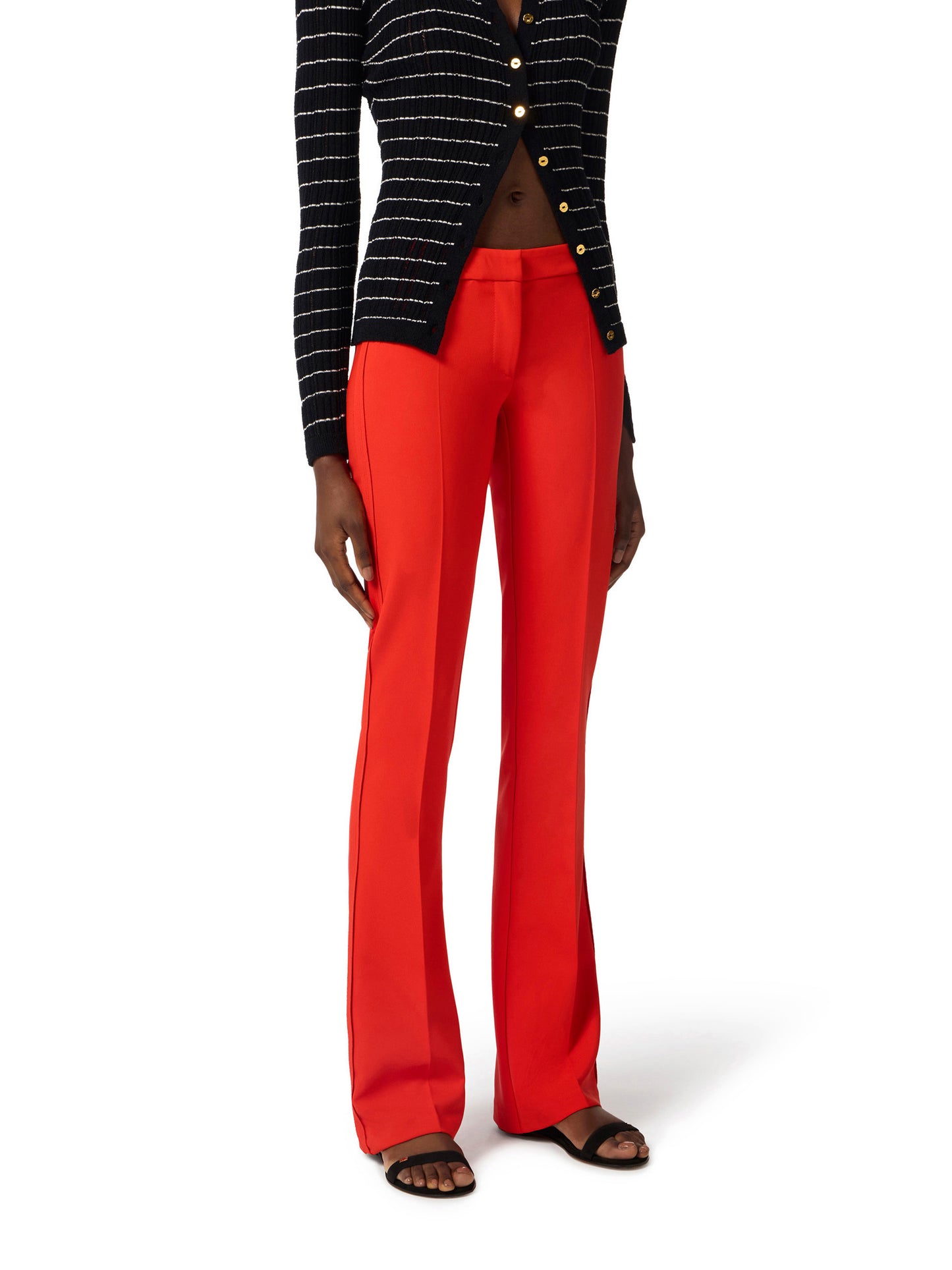 Trousers in lightweight crêpe fabric with raw-edge trims