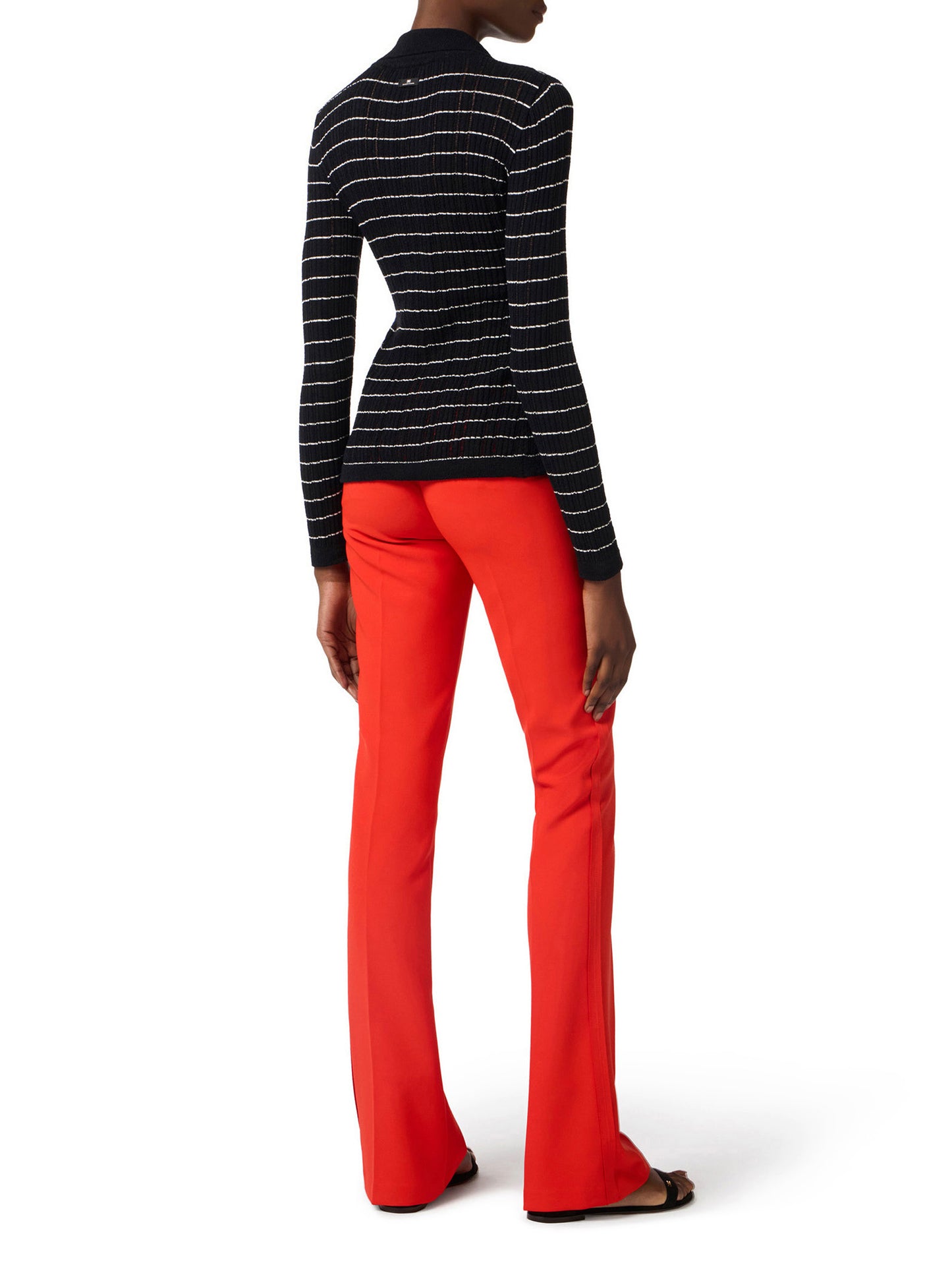 Trousers in lightweight crêpe fabric with raw-edge trims