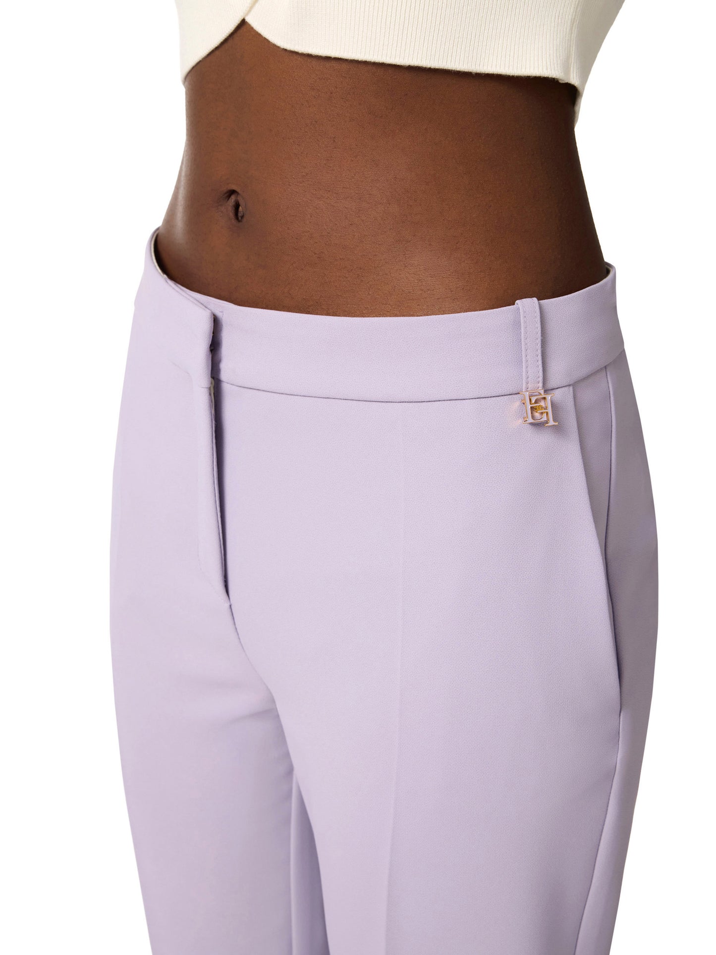 Trousers in lightweight crêpe fabric with logo charm
