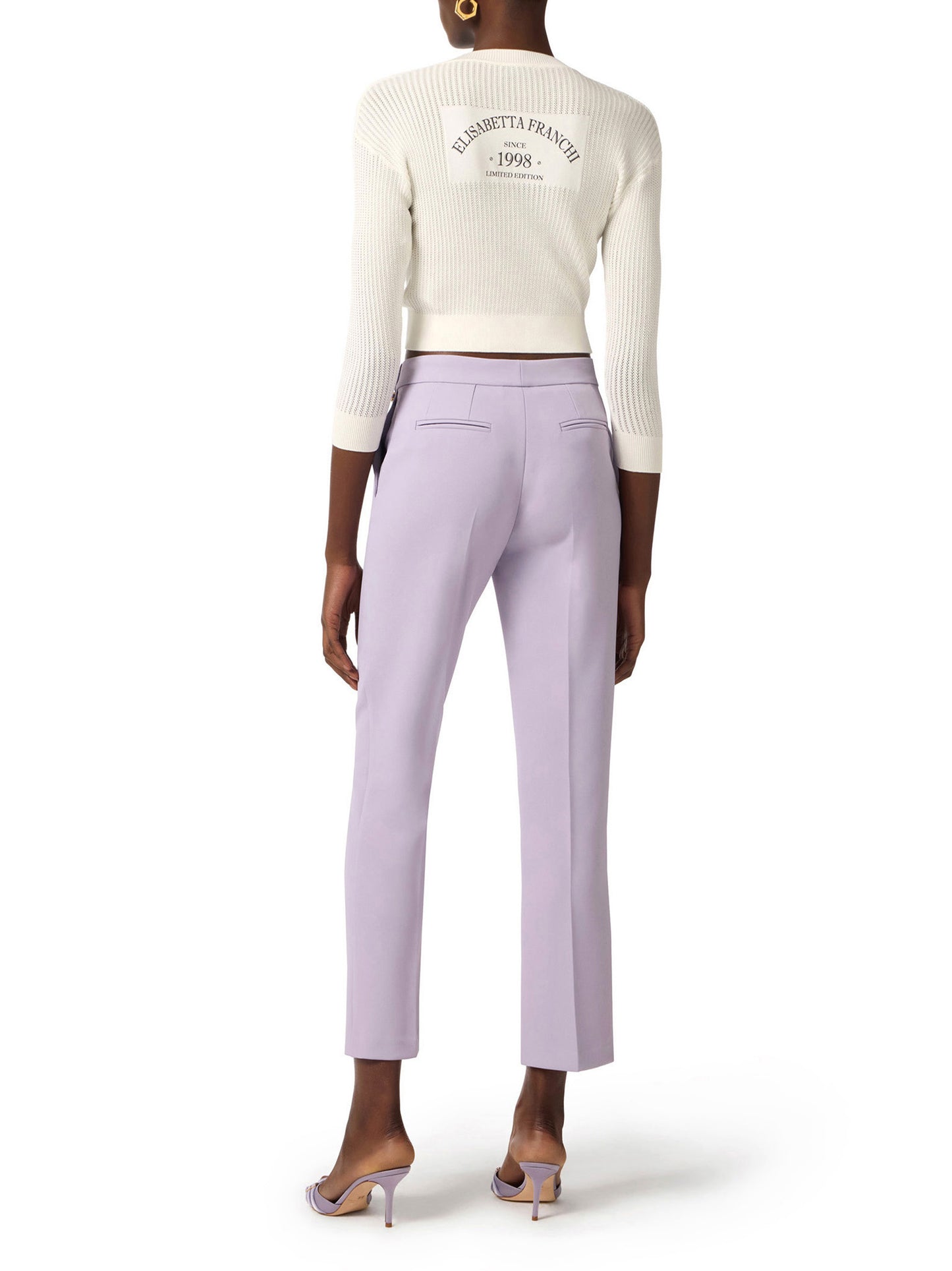 Trousers in lightweight crêpe fabric with logo charm