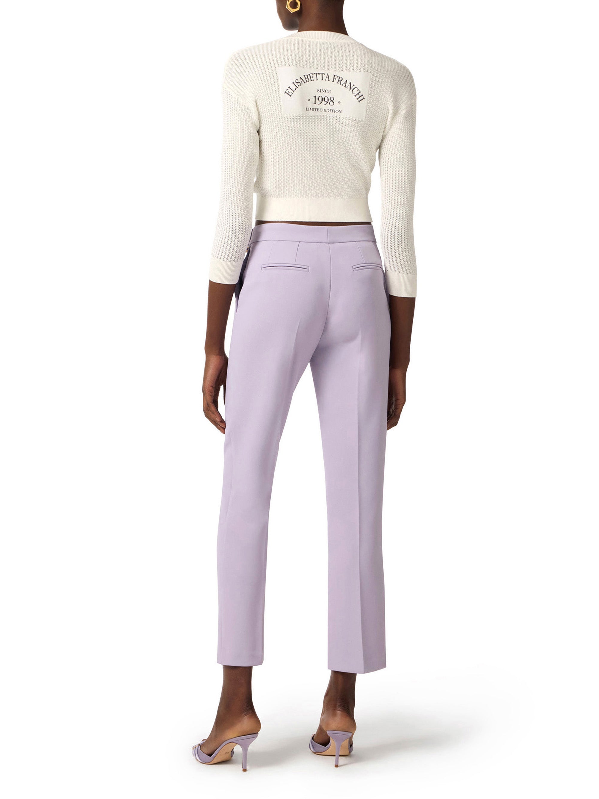 Trousers in lightweight crêpe fabric with logo charm