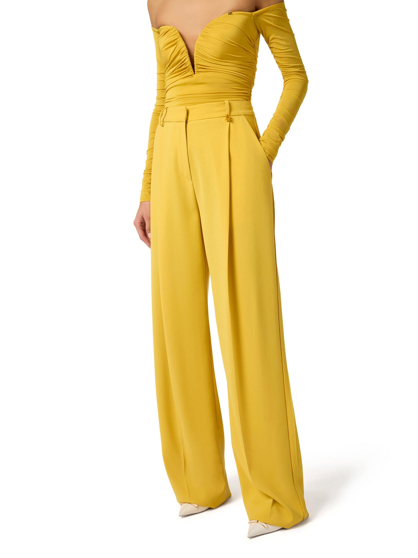 Trousers in lightweight crêpe fabric with logo charm