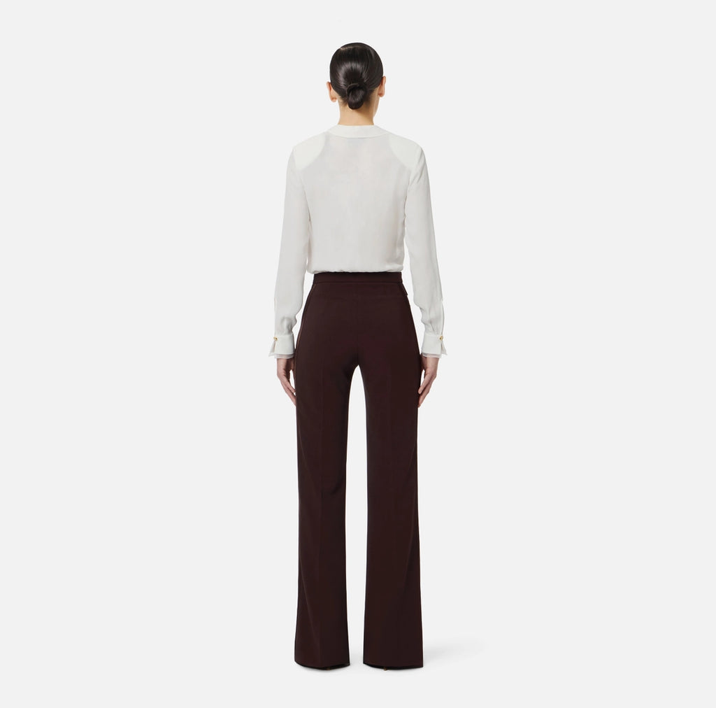 Trousers in lightweight crêpe and satin fabrics