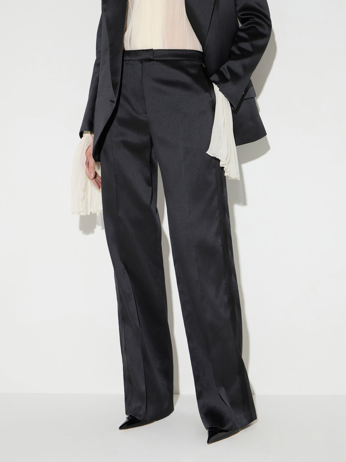 Trousers in gazar and satin fabric