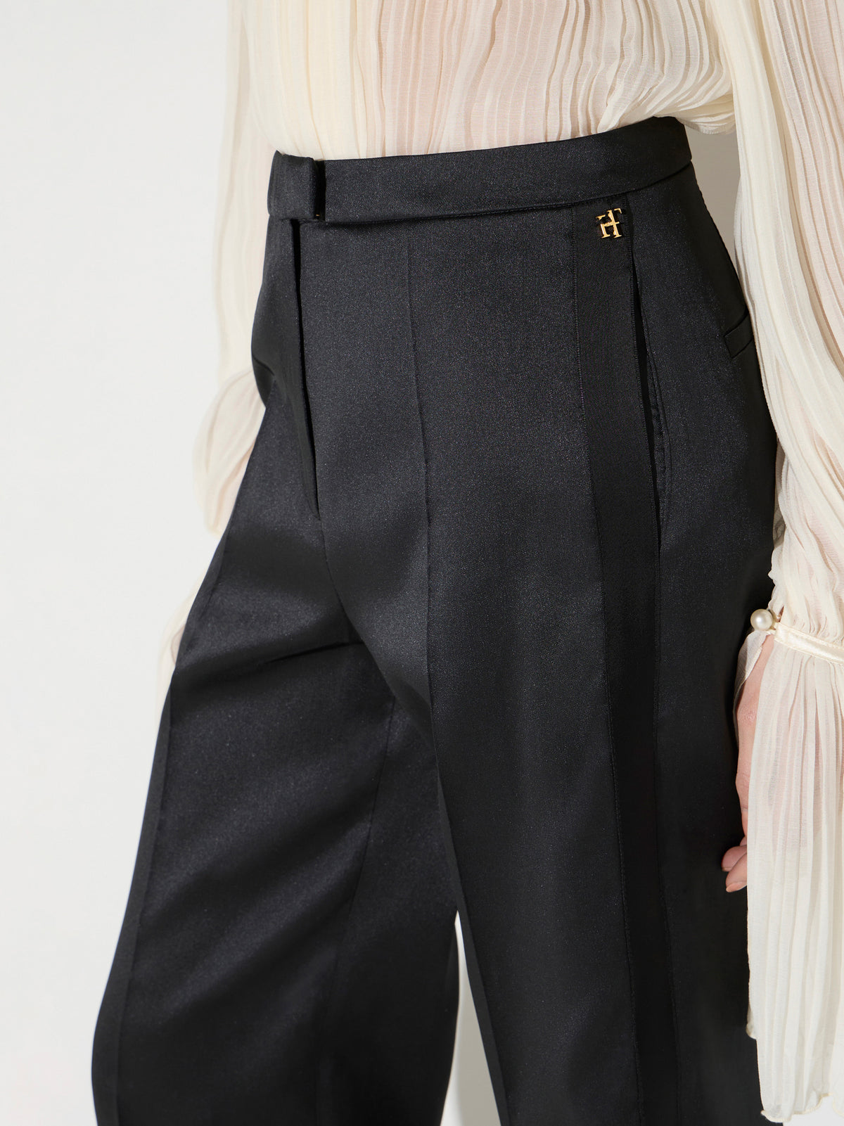 Trousers in gazar and satin fabric