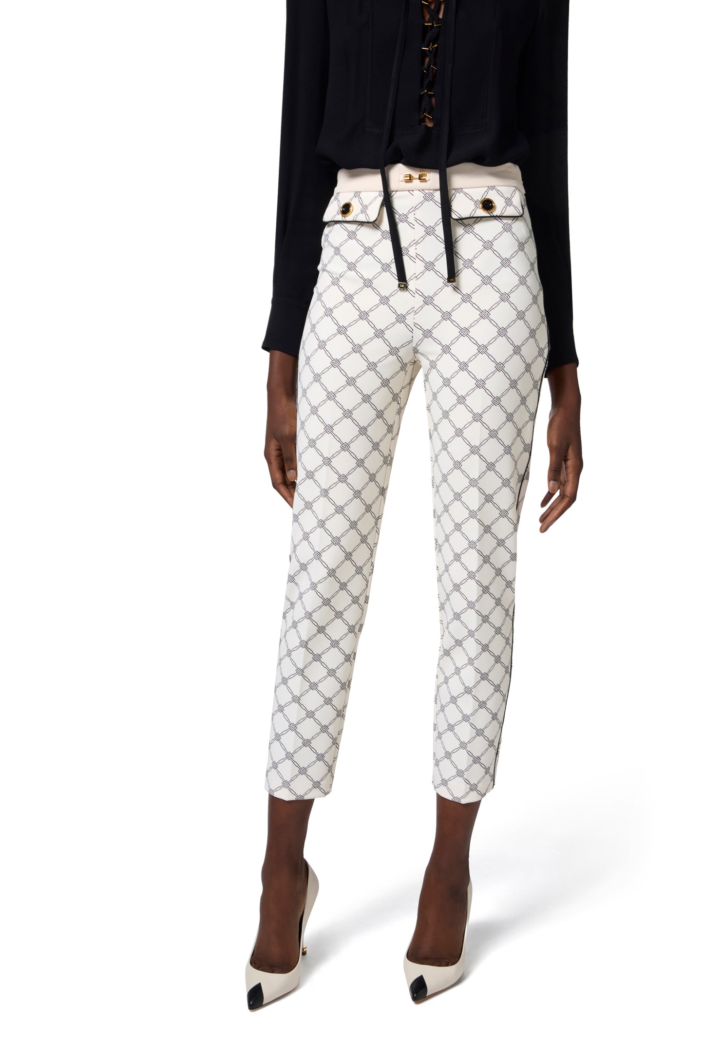 Trousers in crêpe fabric with diamond print