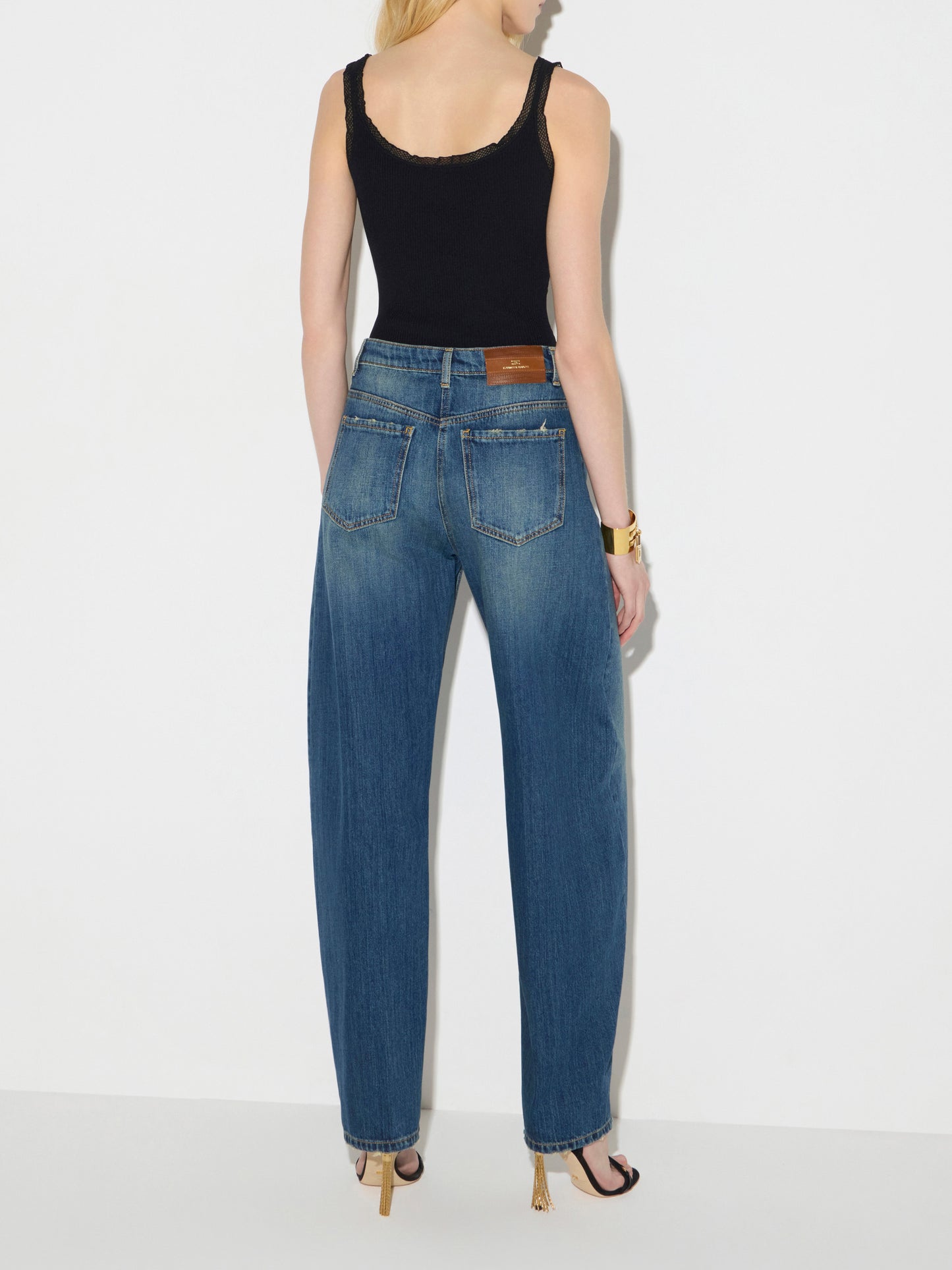 Balloon jeans with jewel buttons