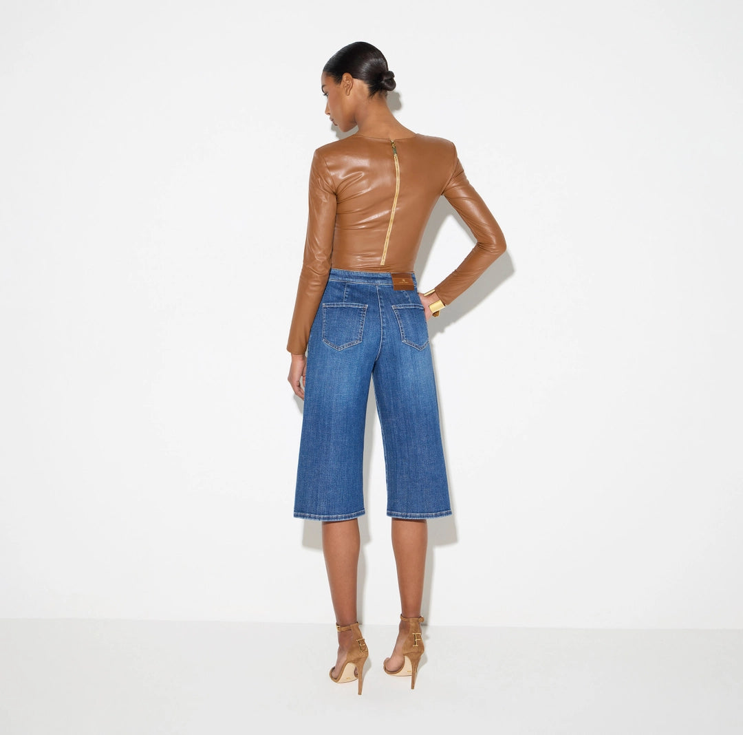 Denim bermuda shorts with row of buttons