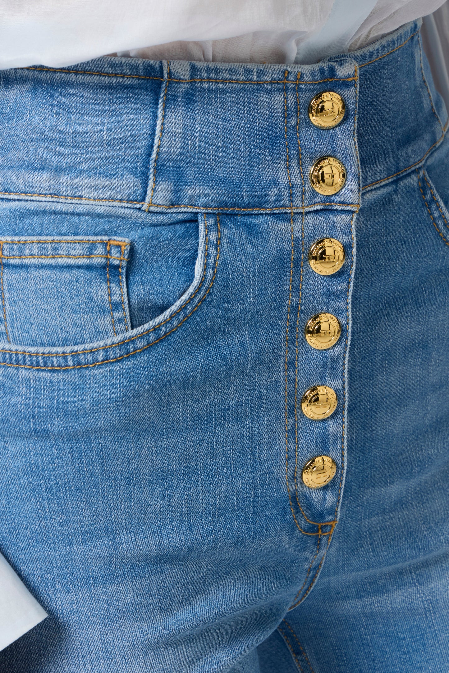 High-waist jeans with logo buttons