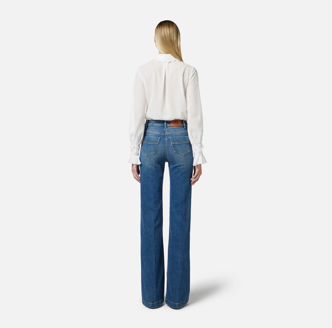 Bell-bottom jeans with row of buttons