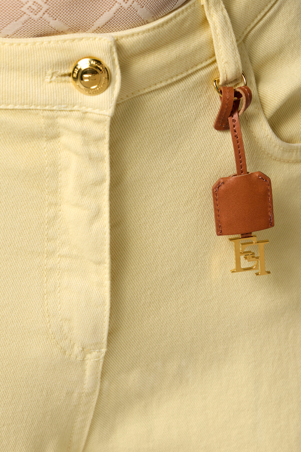 Dyed cotton jeans with logoed charm | LAST PIECE: 25