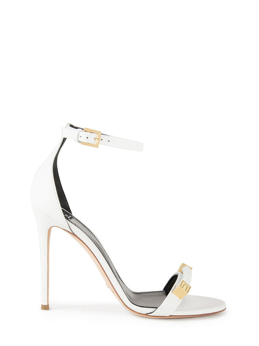 High-heeled sandals with gold accents
